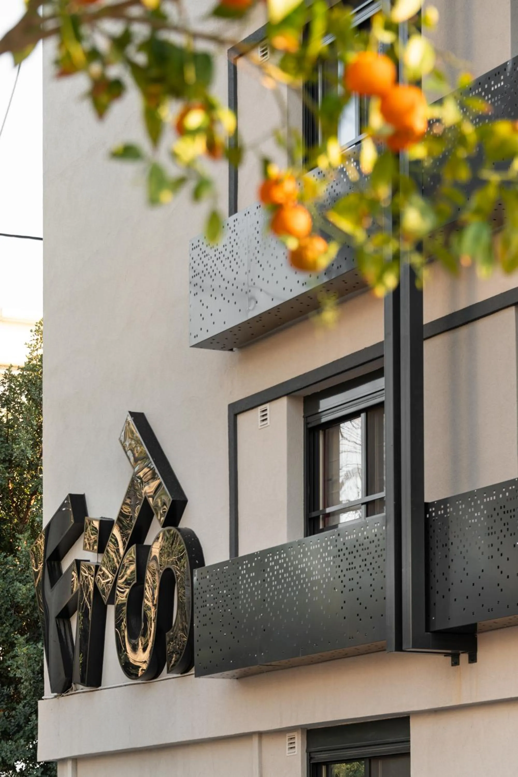 Property logo or sign in Fits Living