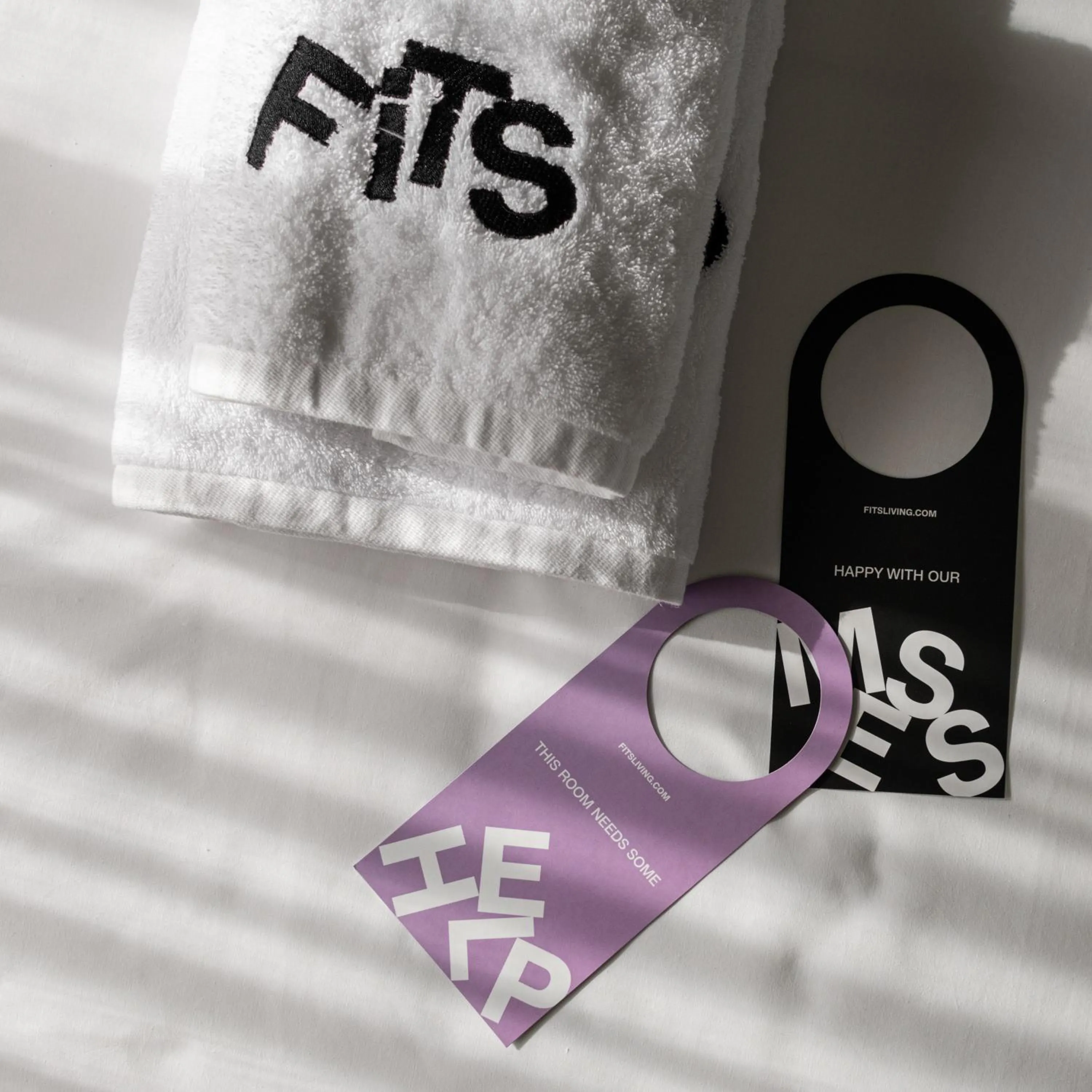 Property logo or sign in Fits Living