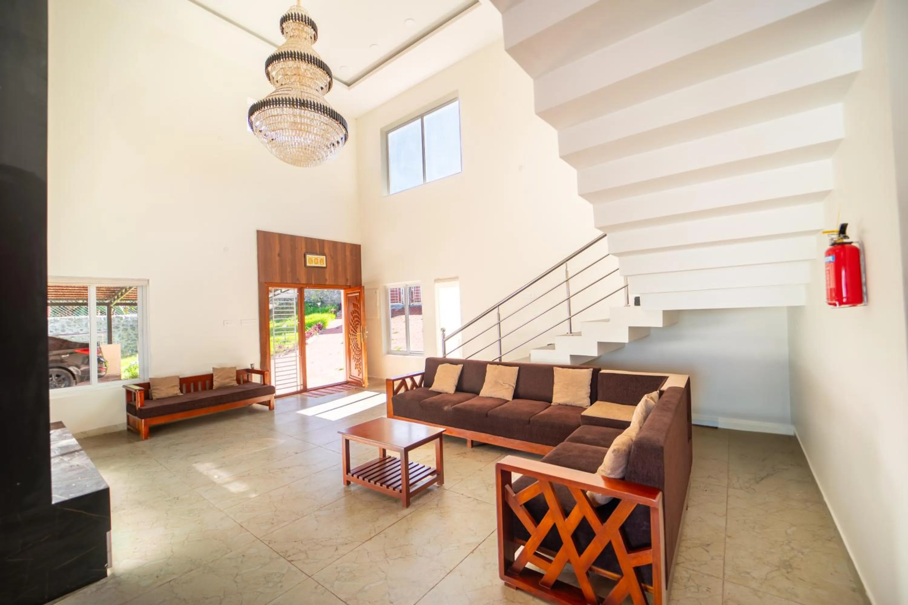 Living room in Queen's Hotel Mount garden Kodaikanal