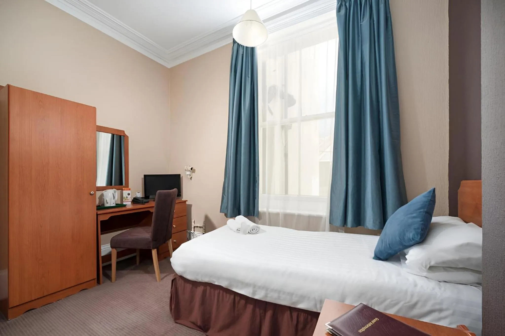 Bed in The Carlton Hotel