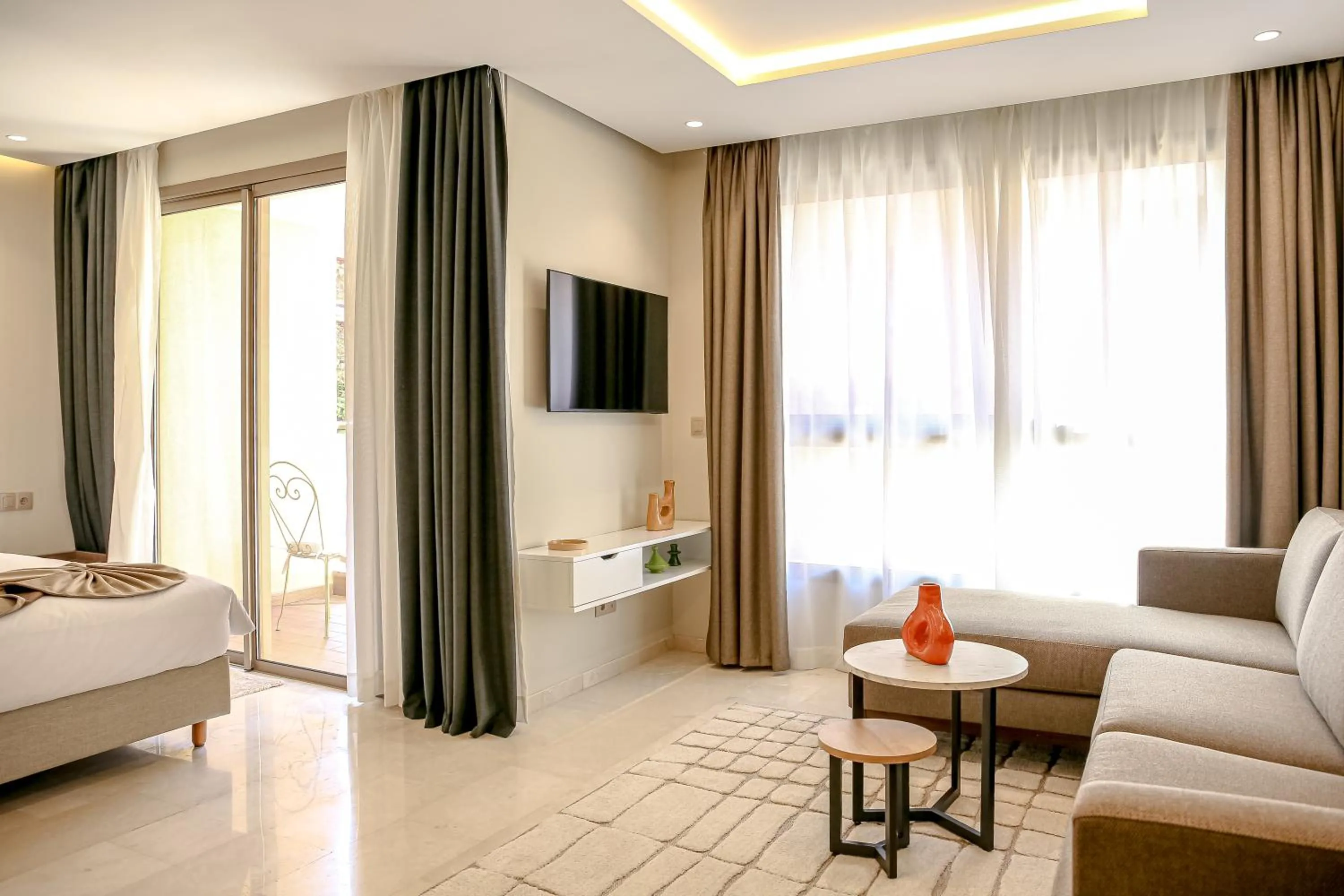 Living room, Bed in Residence Eden Marrakech