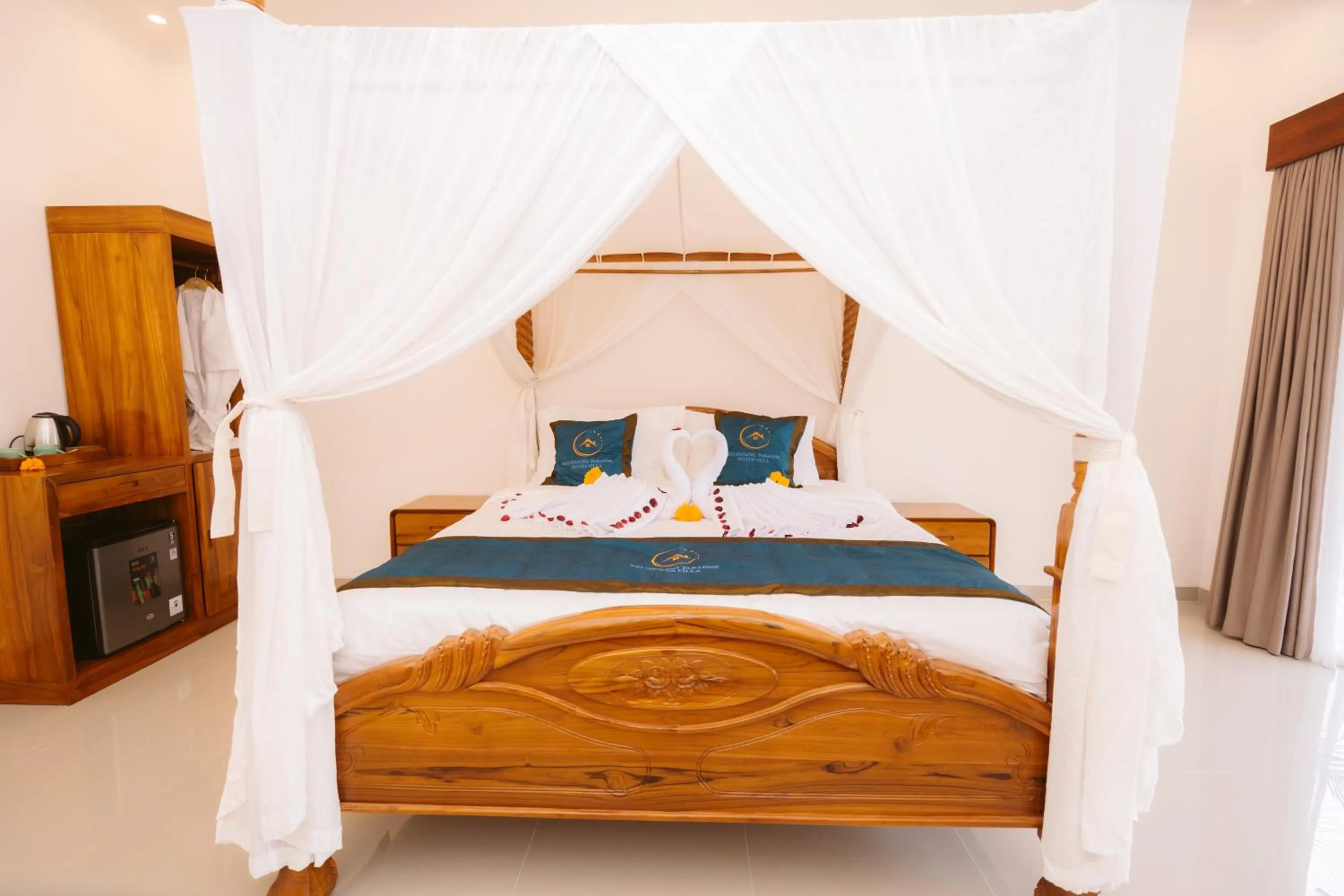 Bed in Kelingking Paradise Suites Villa