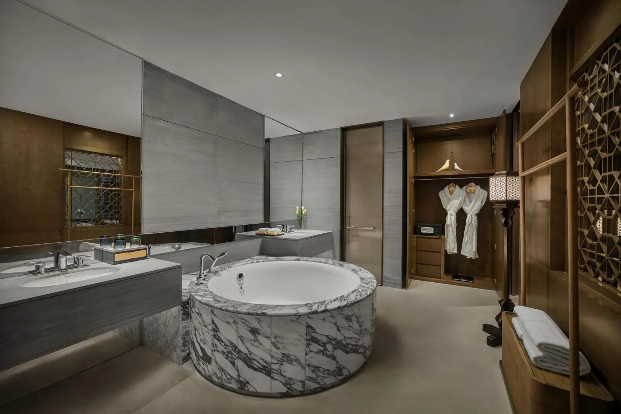 Bathroom in voco Zhengzhou Garden Expo by IHG