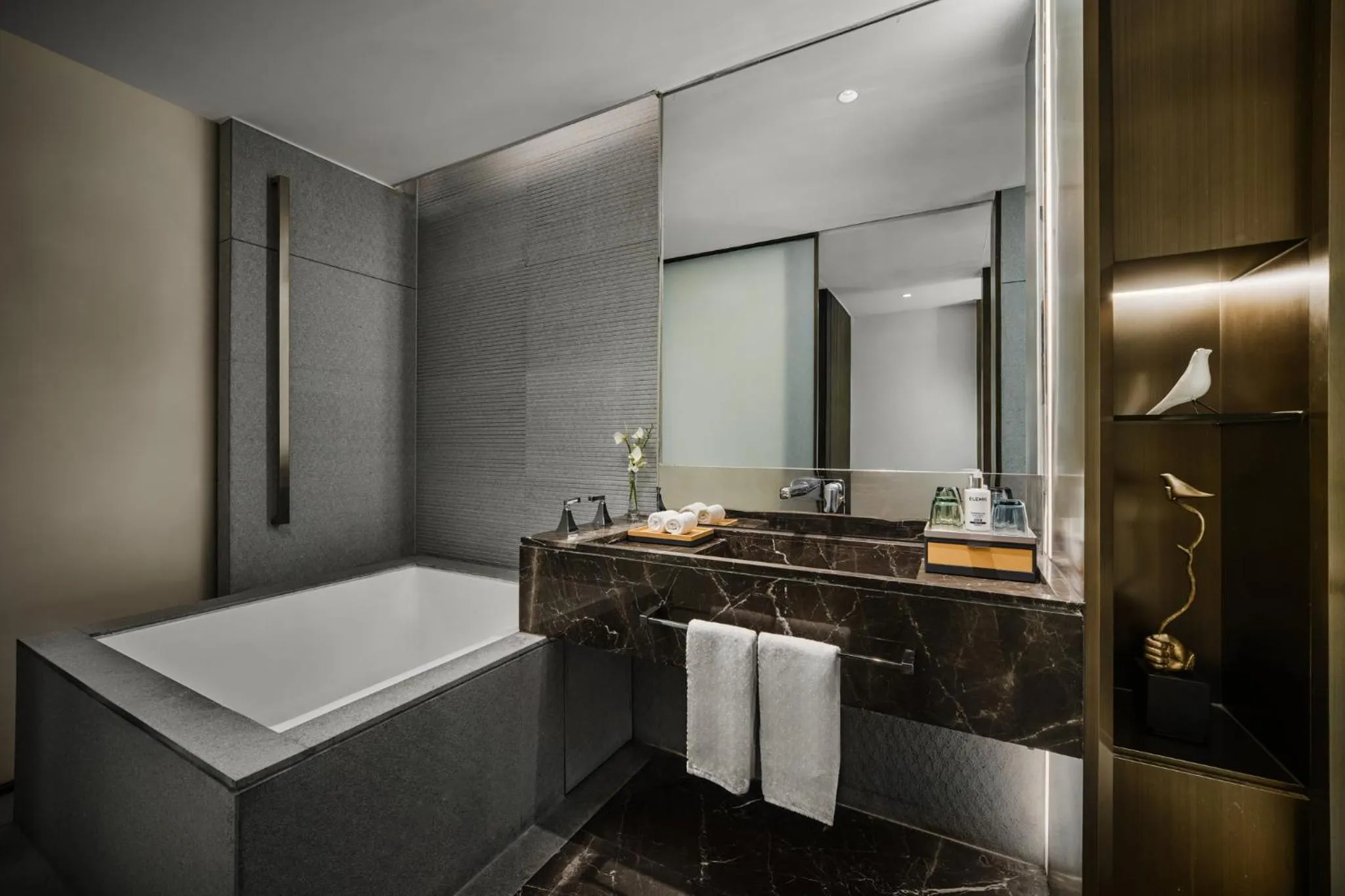 Bathroom in voco Zhengzhou Garden Expo by IHG