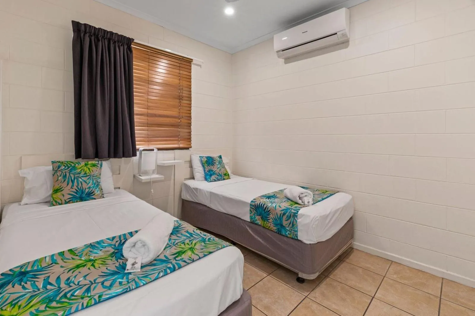 Bed in Whitsunday Waterfront Apartments