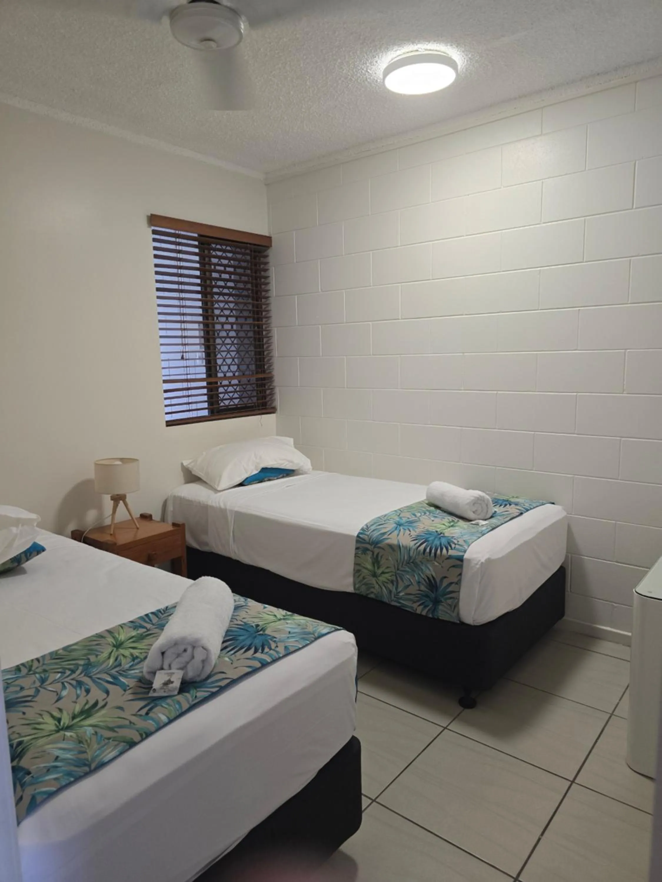 Bed in Whitsunday Waterfront Apartments