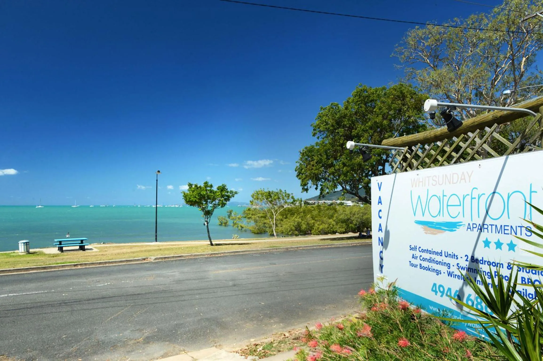 Property logo or sign in Whitsunday Waterfront Apartments