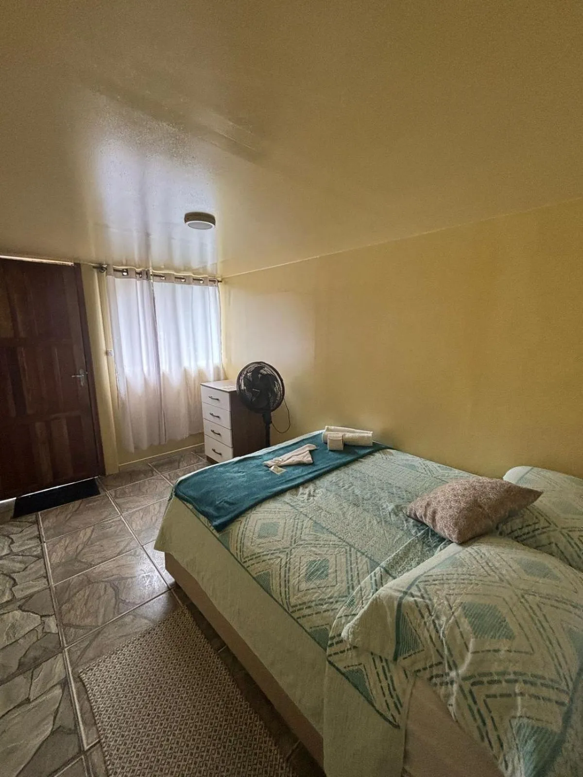 Bed in Pousada & Camping Tubarão