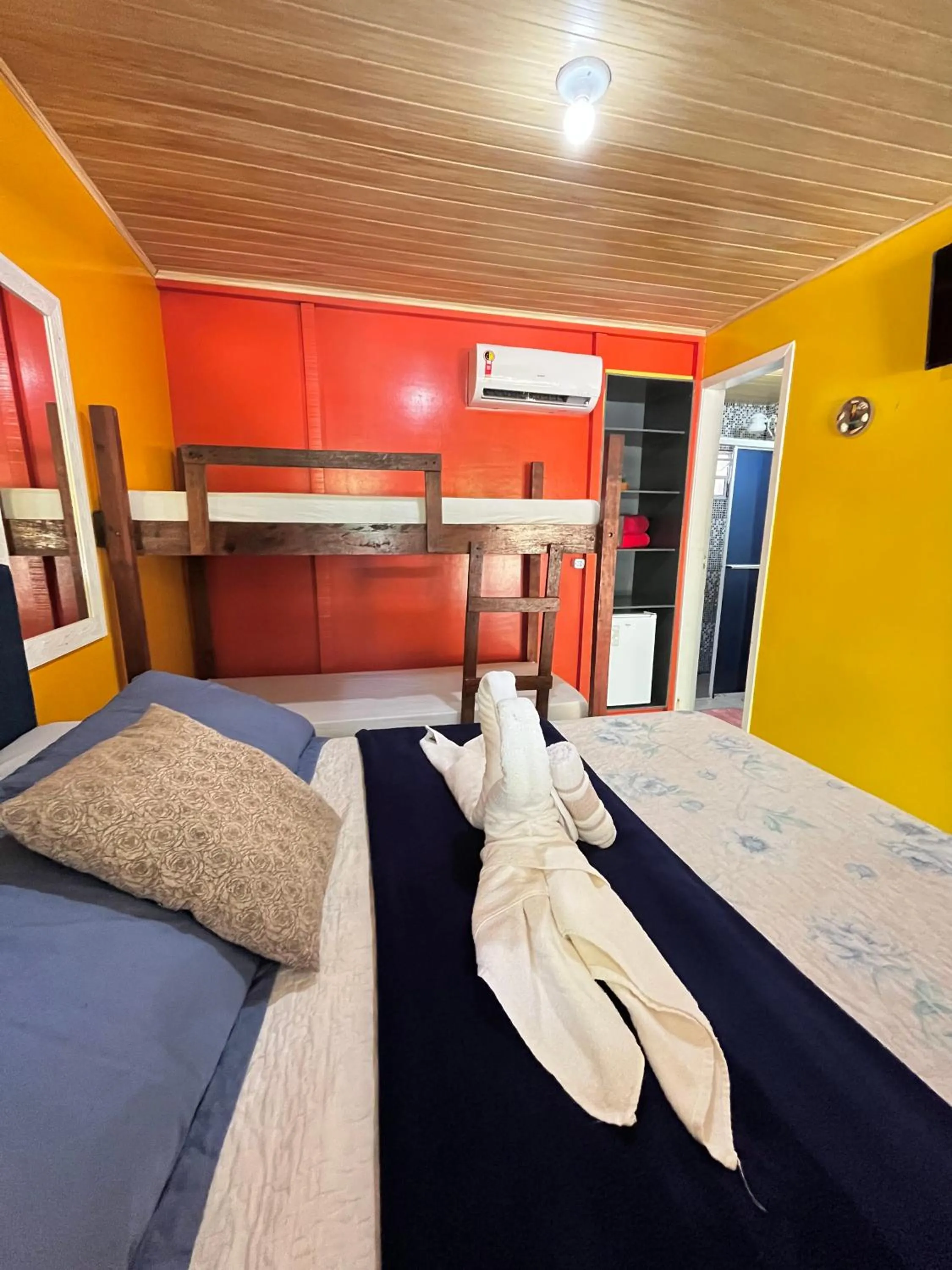 Bed in Pousada & Camping Tubarão