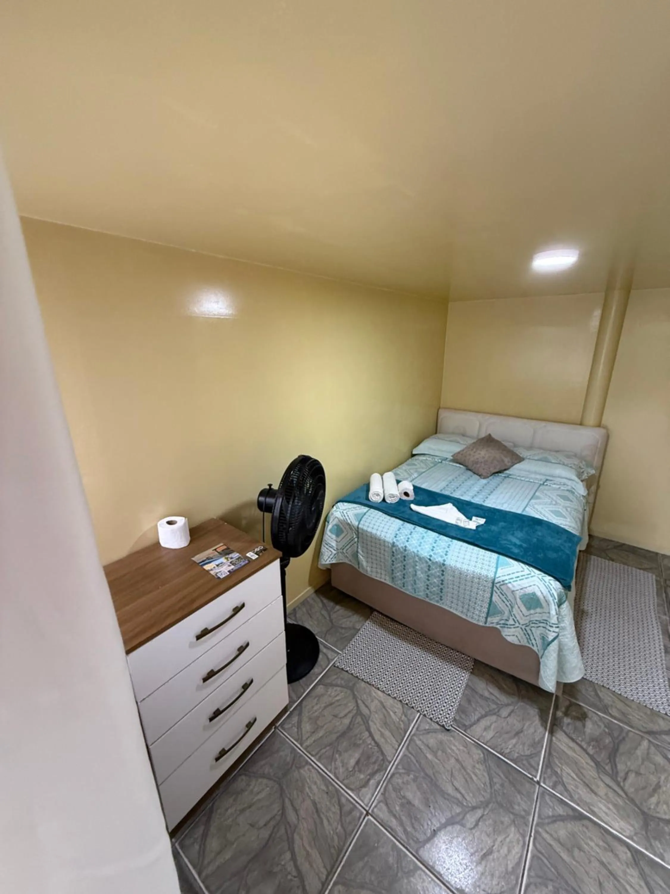 Bed in Pousada & Camping Tubarão
