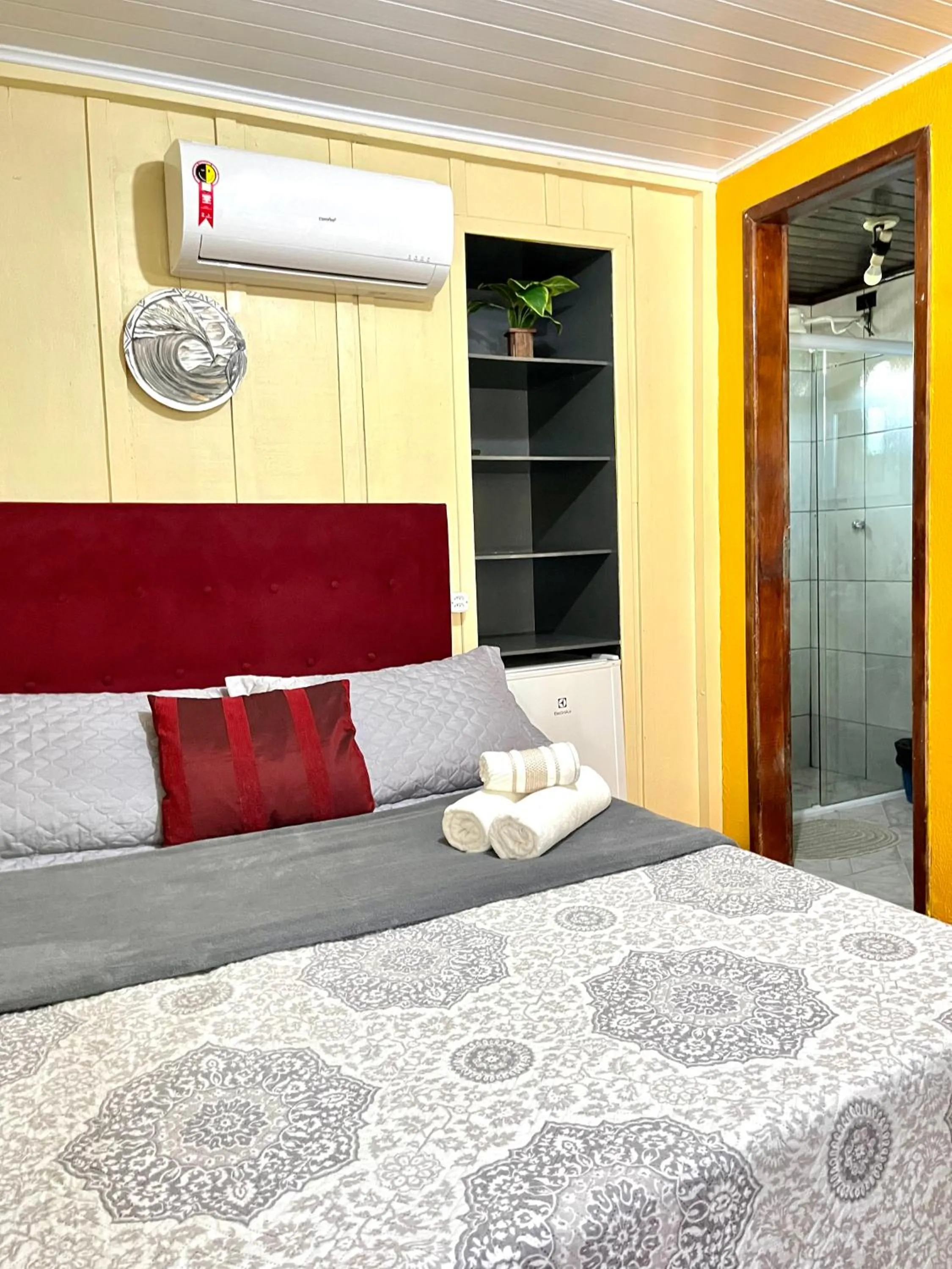 Bed in Pousada & Camping Tubarão