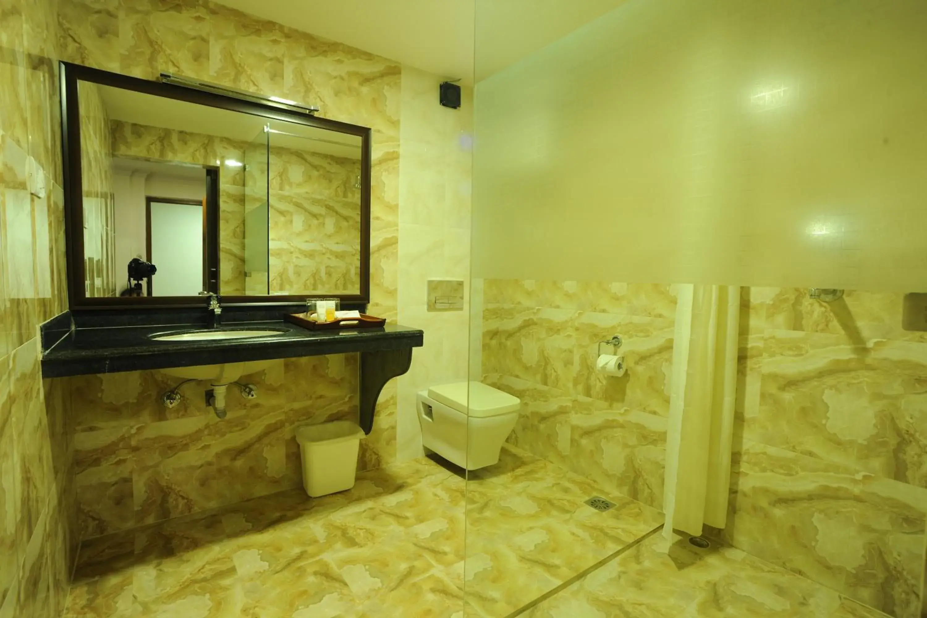 Bathroom in Vannasut Hotel and Spa Bathroom in Vannasut Hotel and Spa