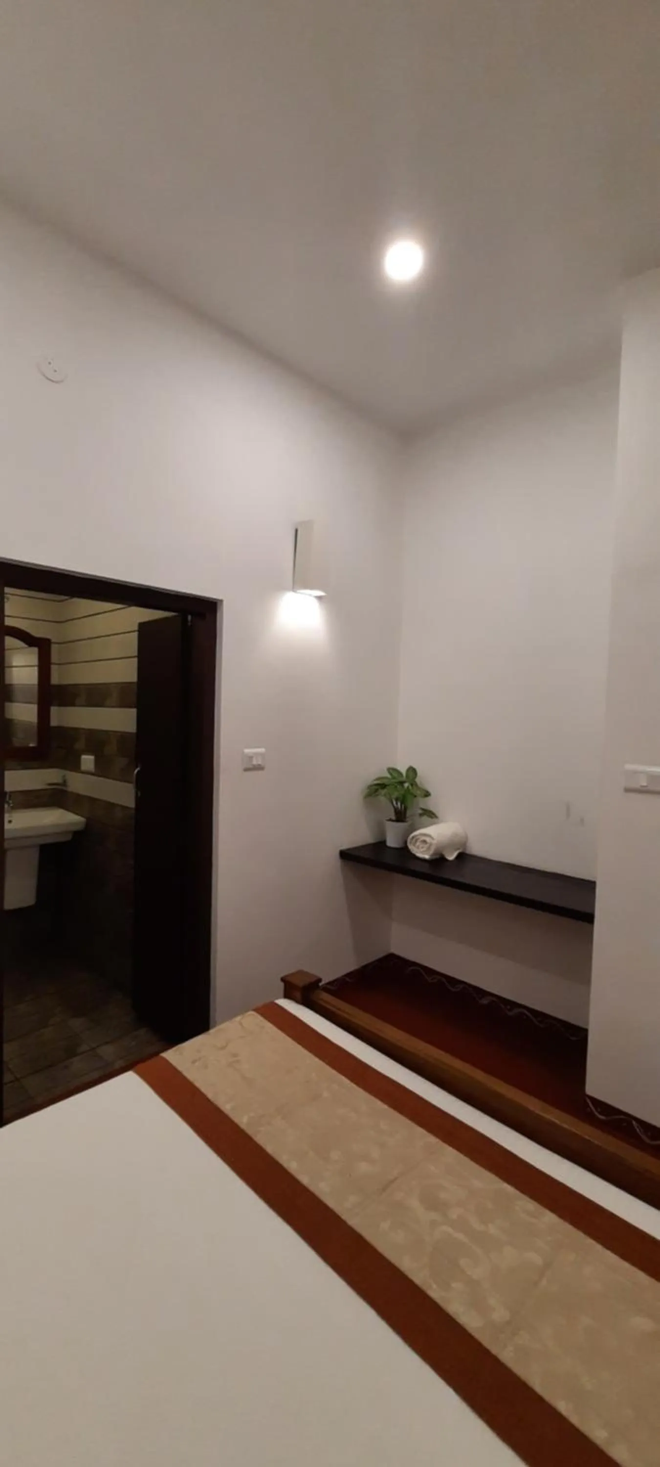 Bed in Marari Umapathi Beach Villa