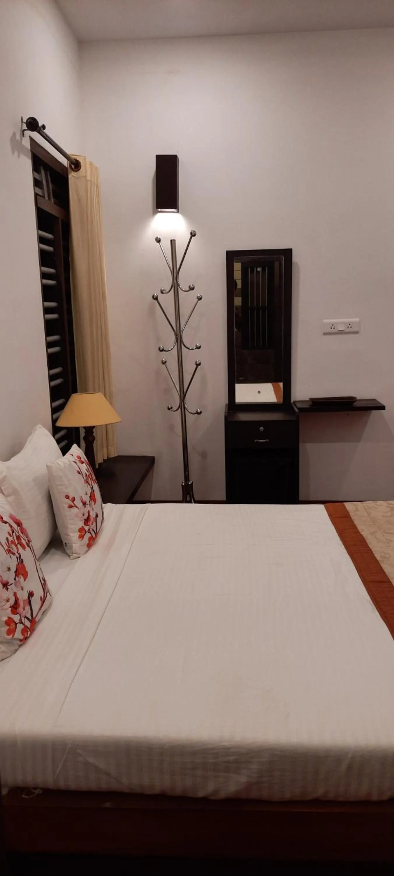 Bed in Marari Umapathi Beach Villa