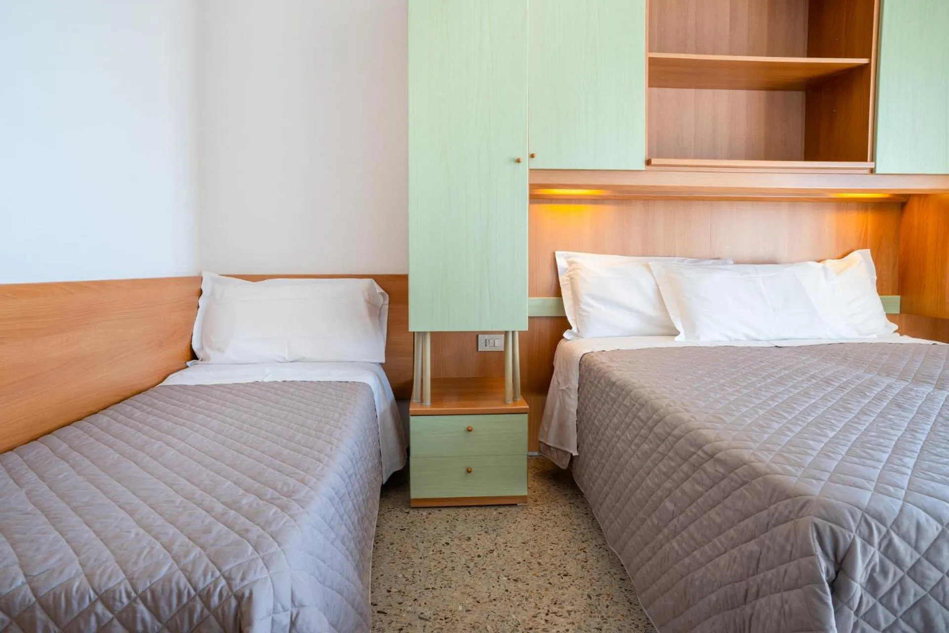 Bed in Hotel Dolomiti