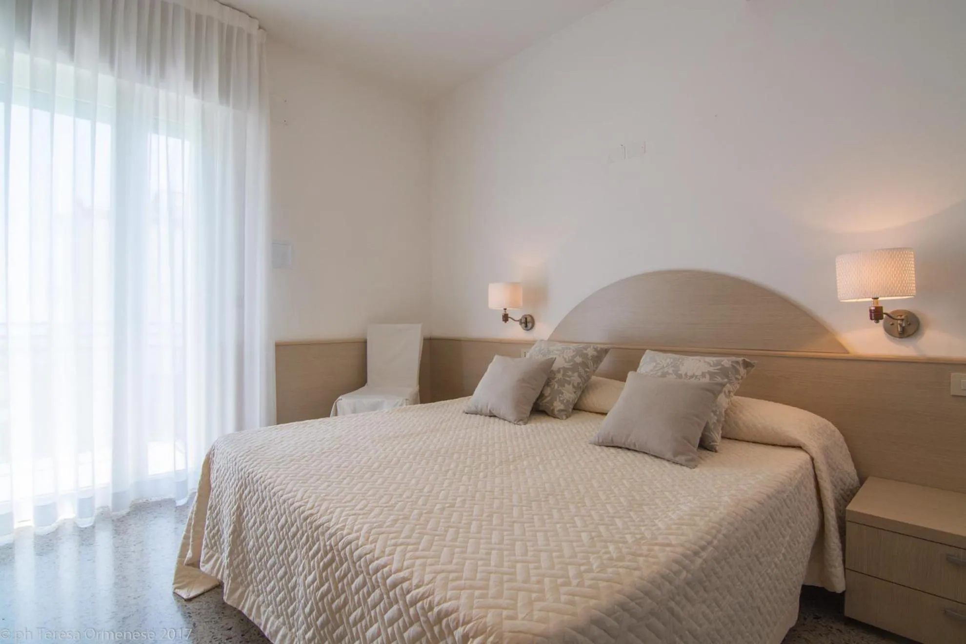 Bed in Hotel Dolomiti