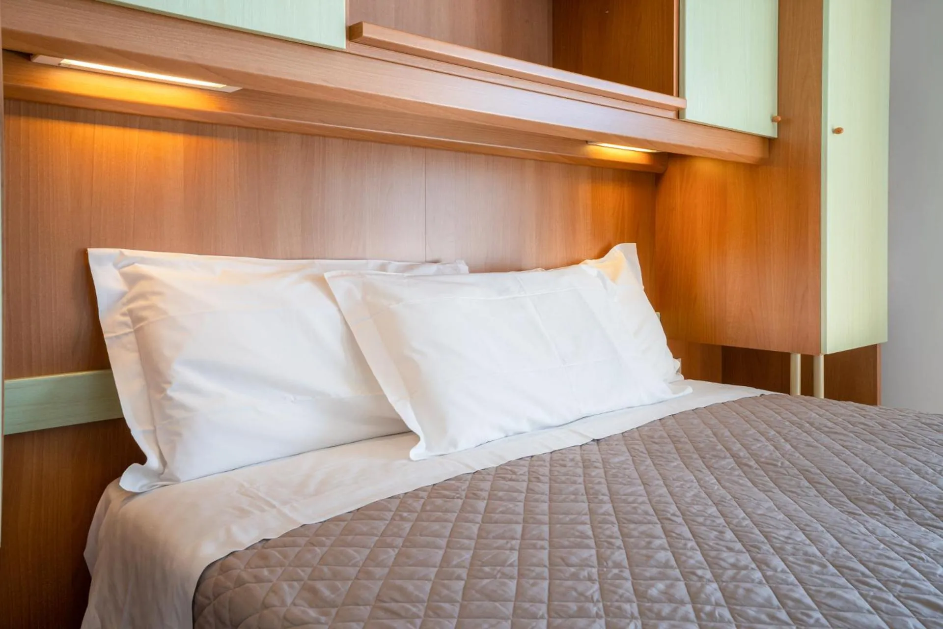 Bed in Hotel Dolomiti