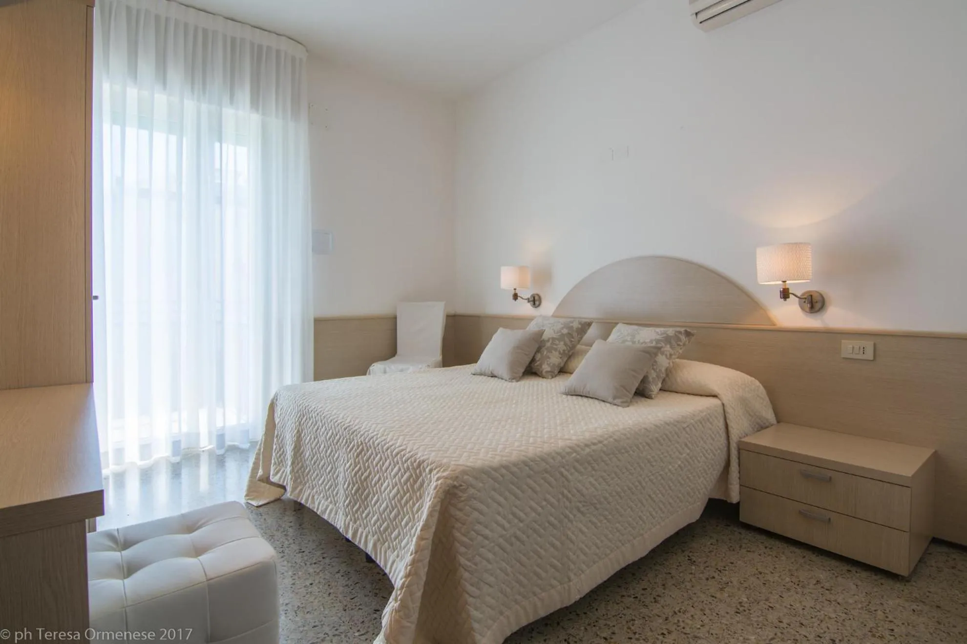 Bed in Hotel Dolomiti