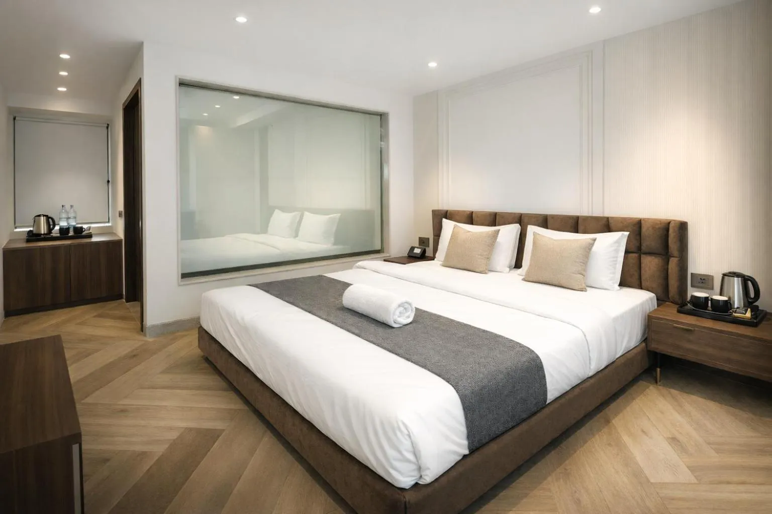 Bed in Qotel Signature Coleman Janakpuri