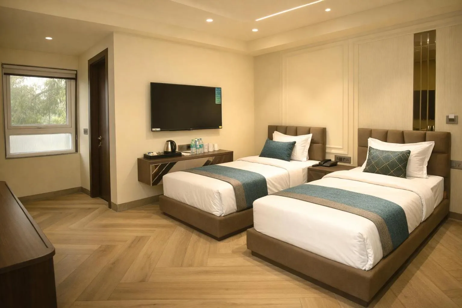 Bed in Qotel Signature Coleman Janakpuri
