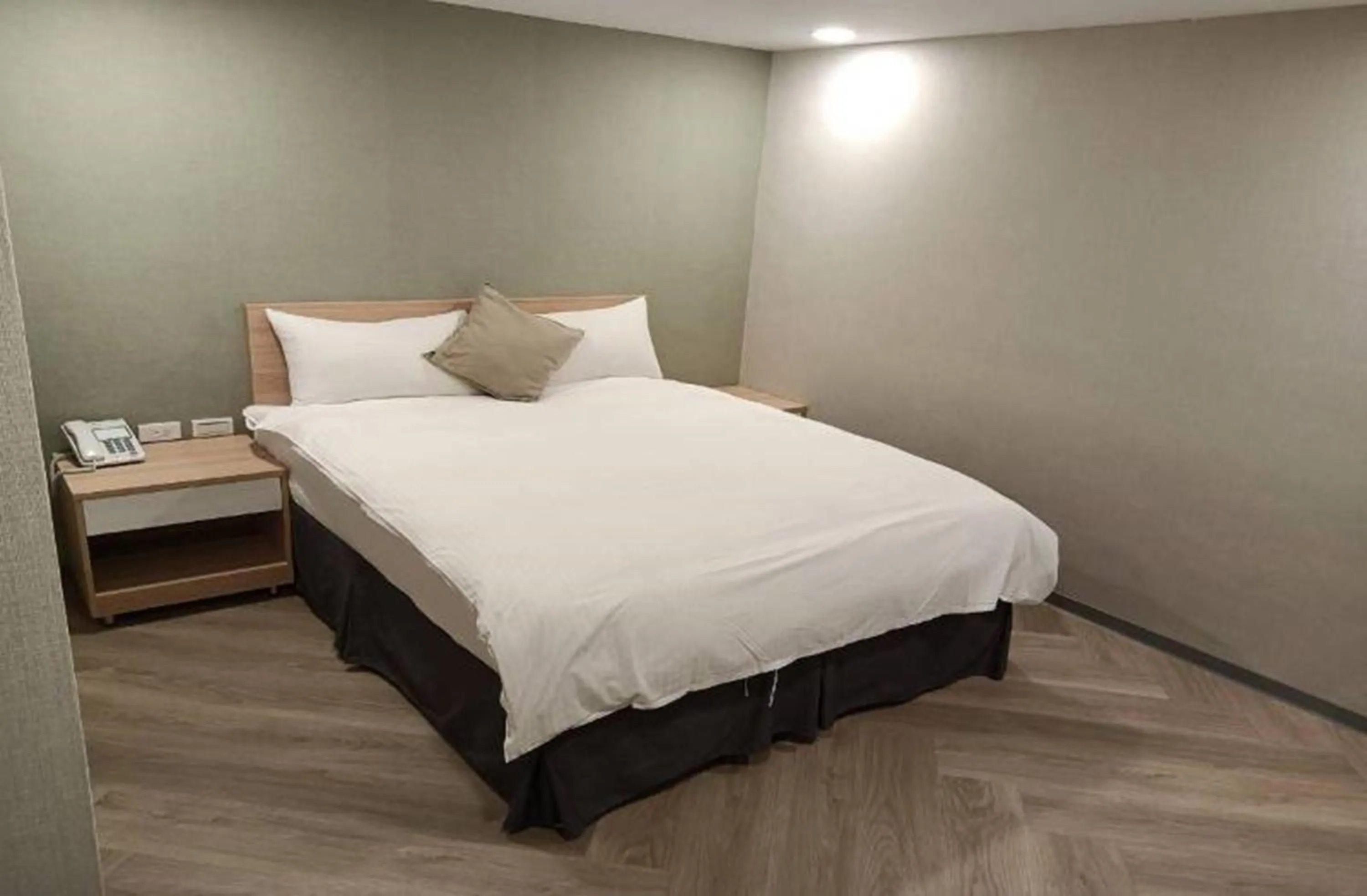 Bed in Mu Chen Hotel