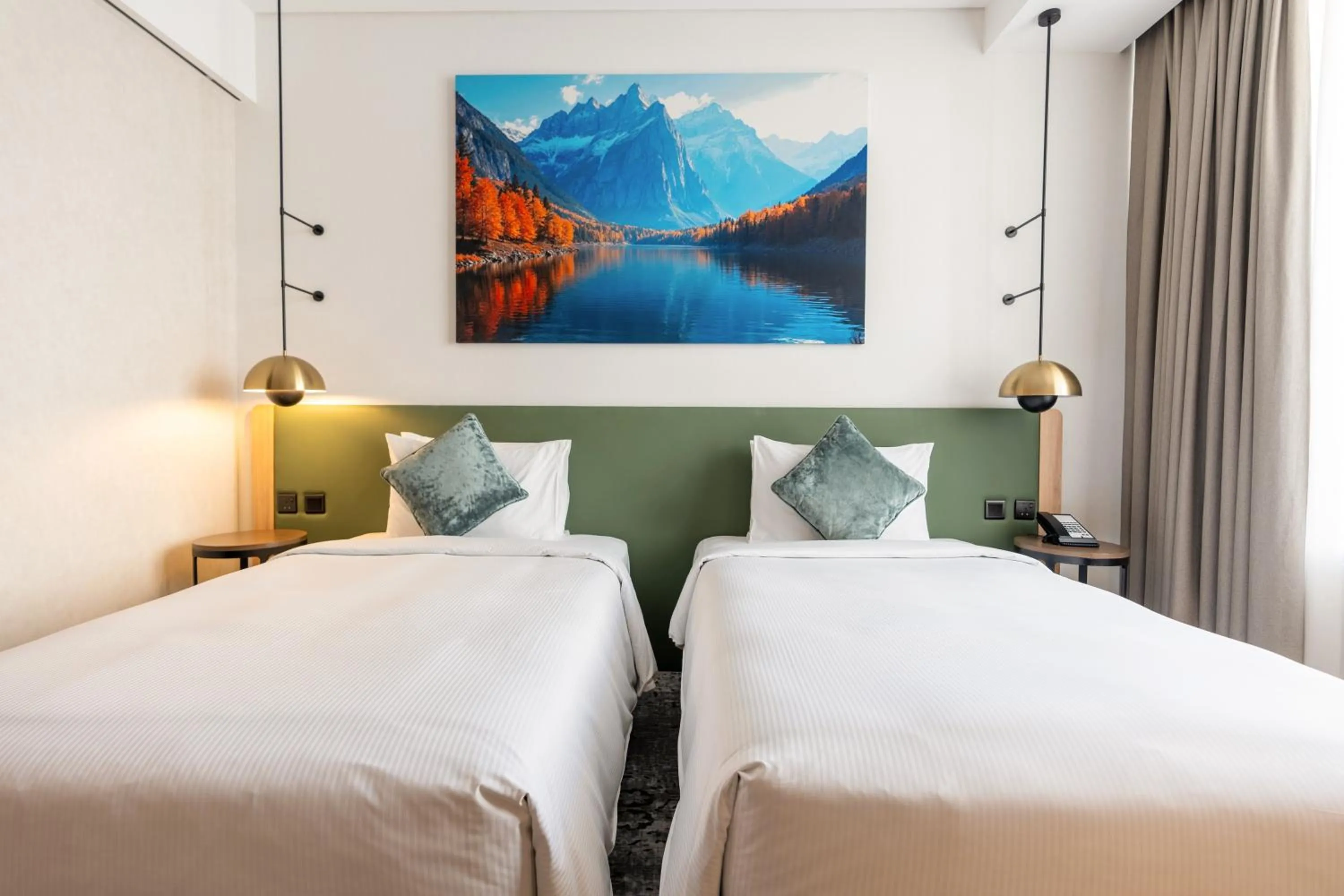 Bed in West Walk Retaj Hotel