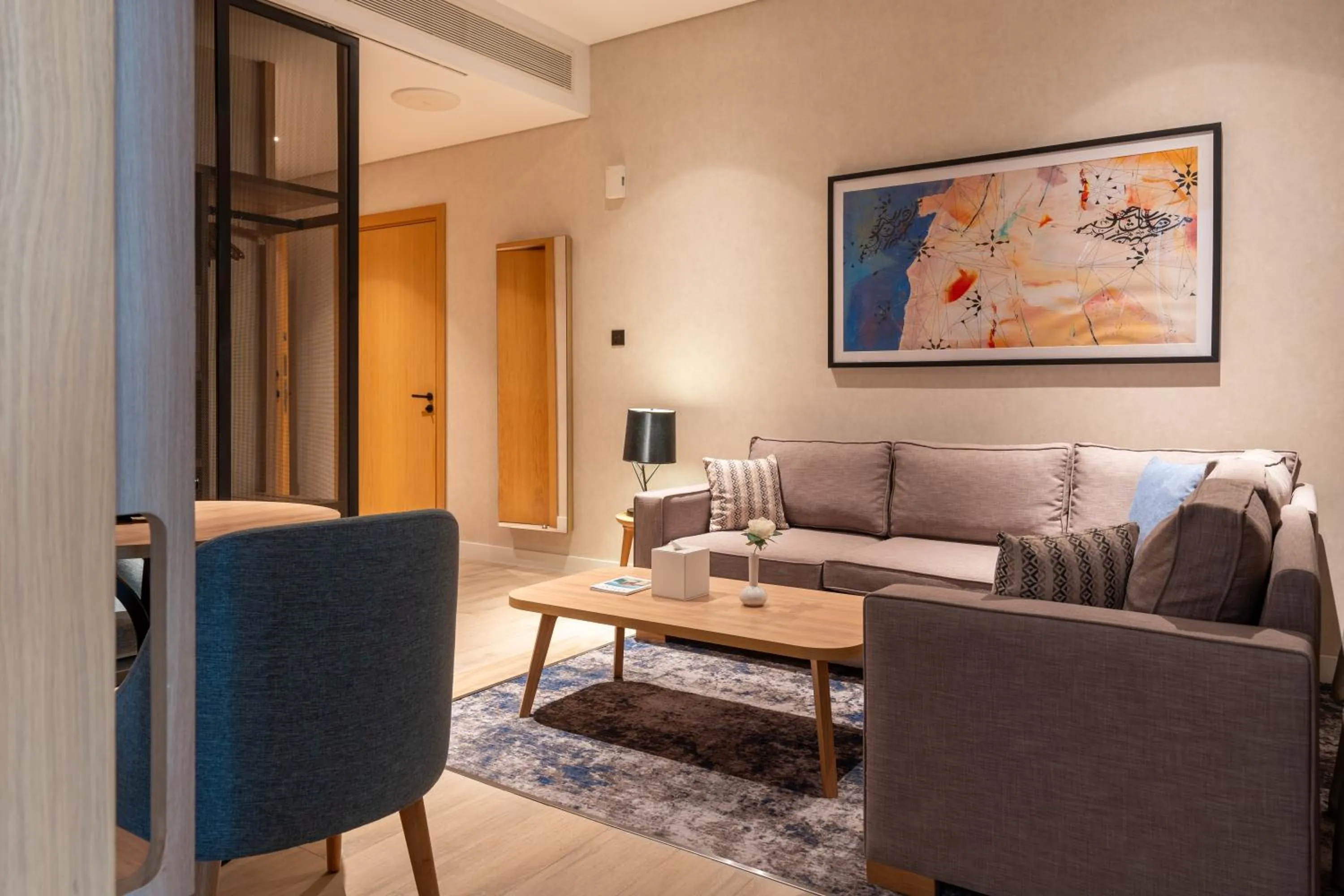 Living room in West Walk Retaj Hotel