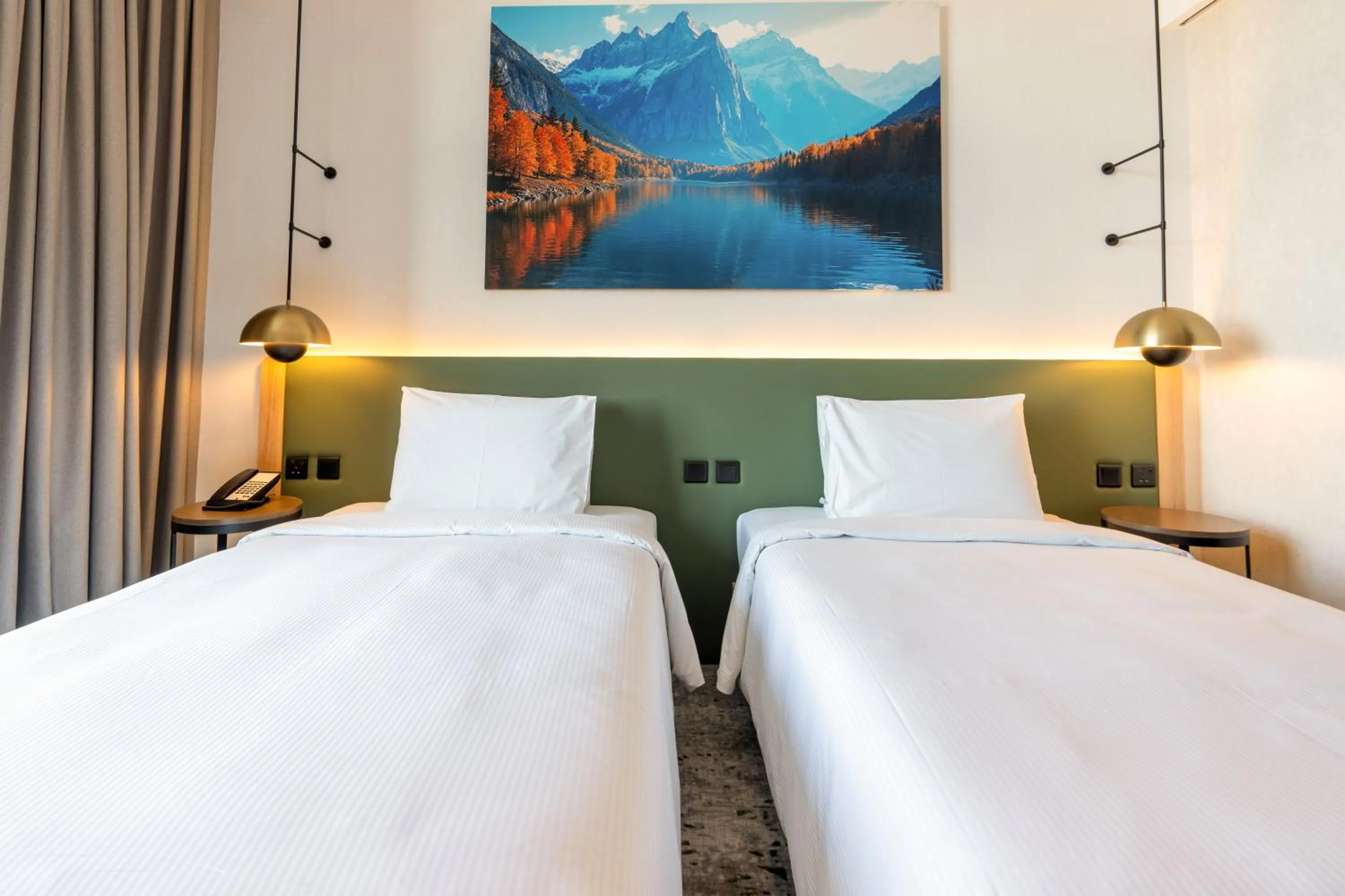 Bed in West Walk Retaj Hotel