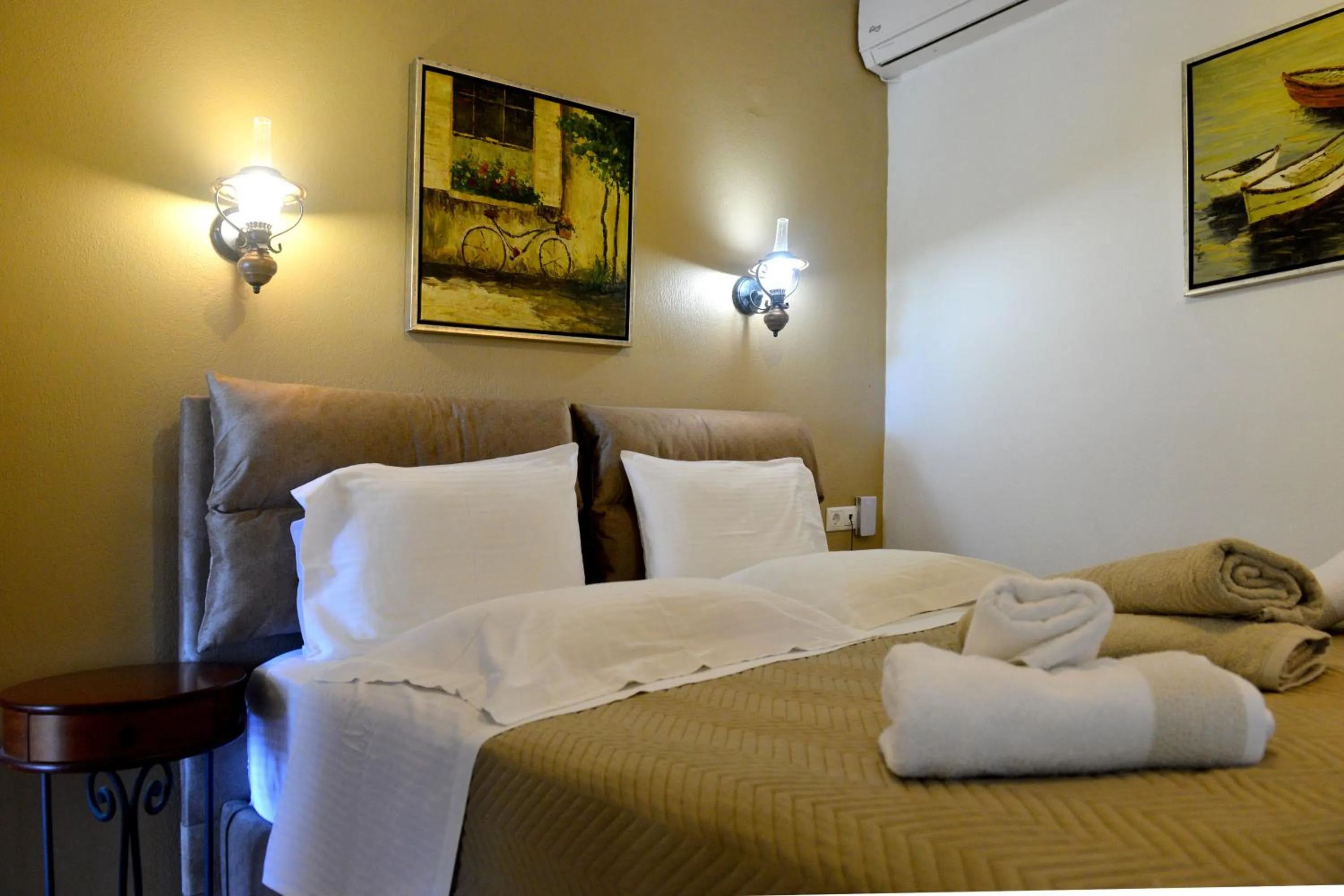 Bed in Skiathos Island Suites