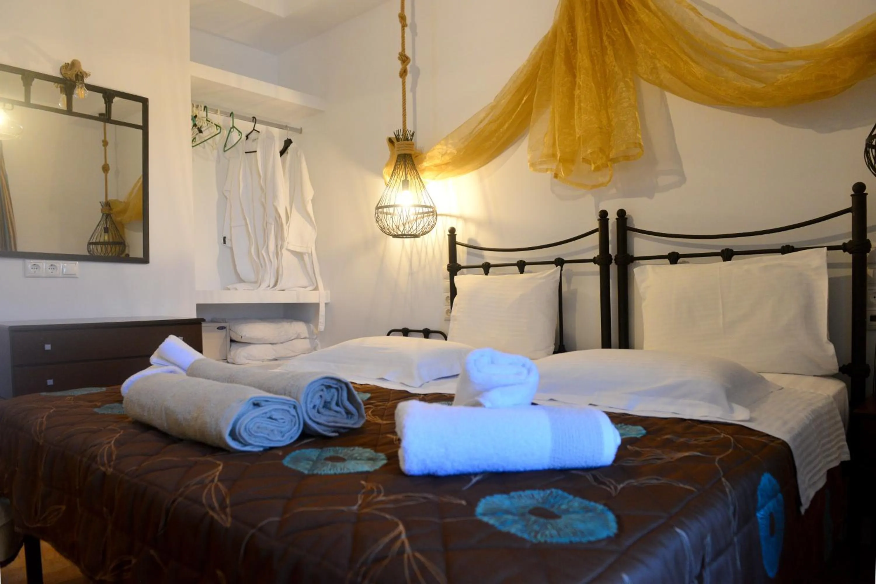 Bed in Skiathos Island Suites