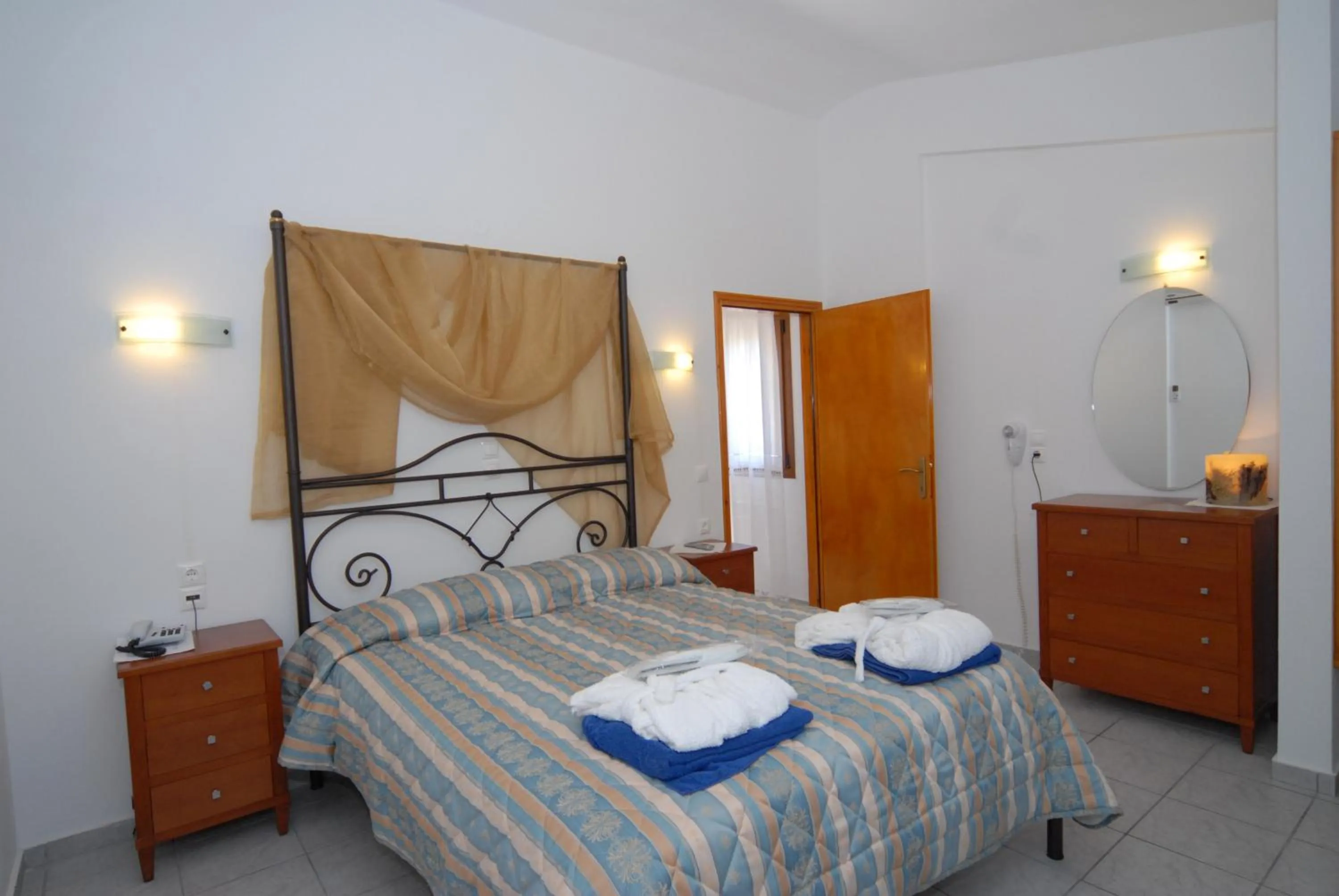 Bed in Skiathos Island Suites
