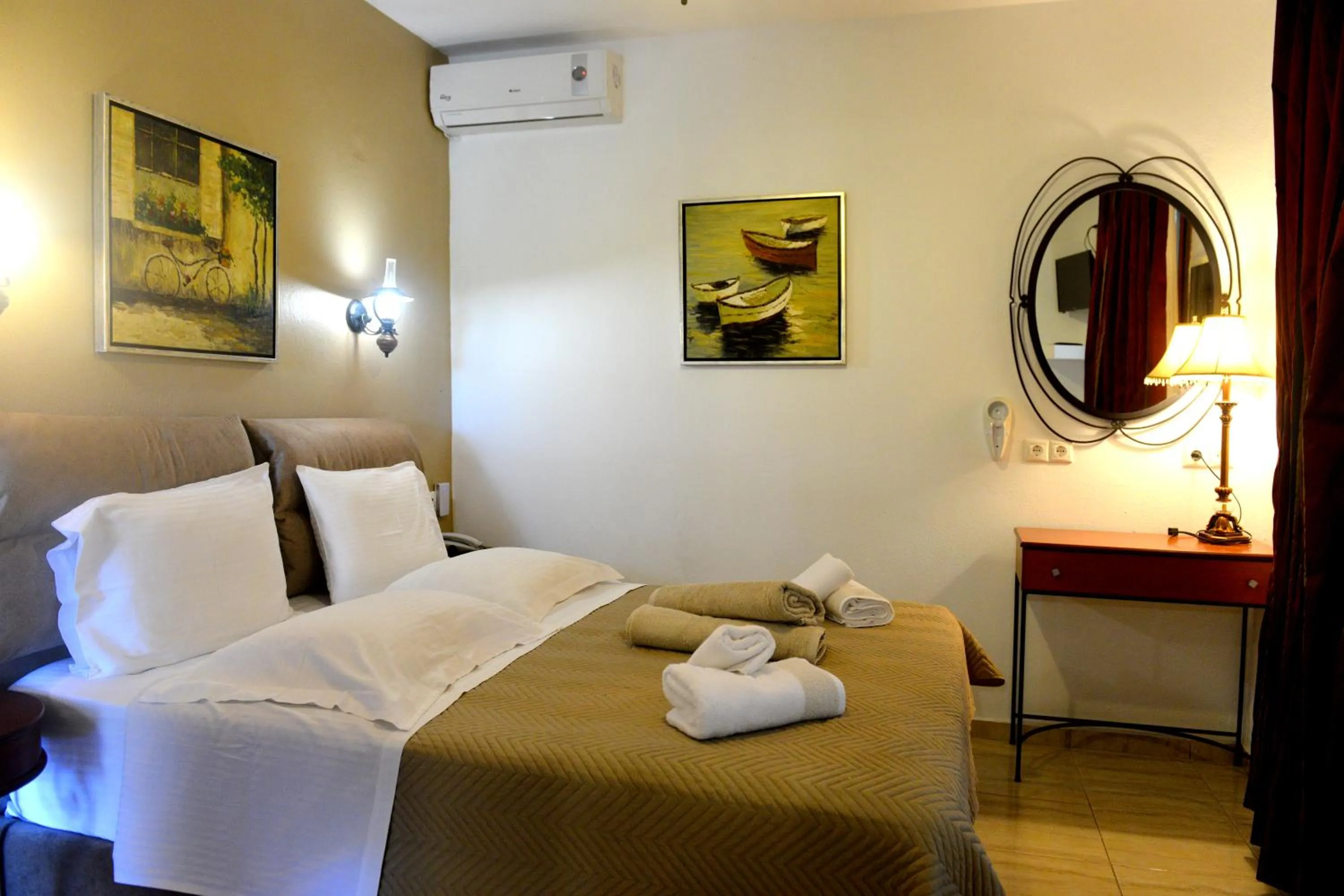 Bed in Skiathos Island Suites