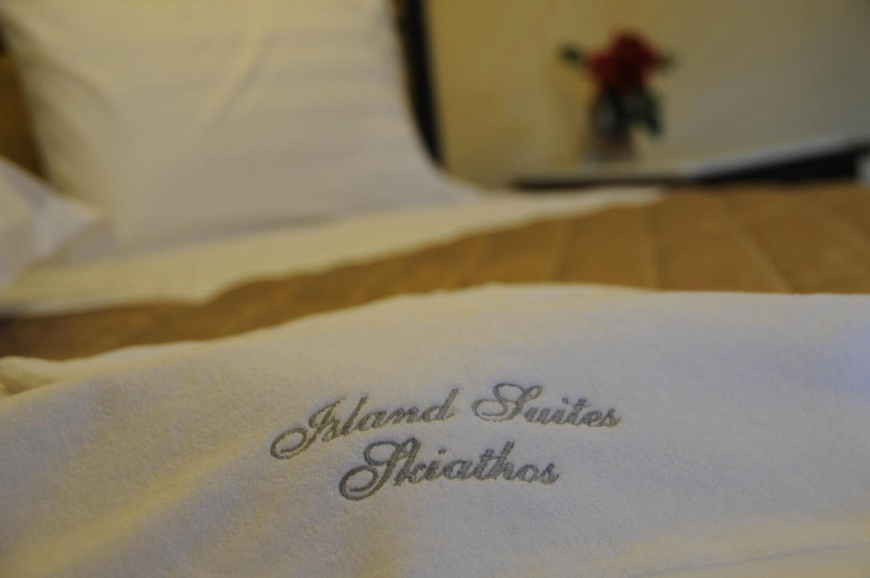 Bed in Skiathos Island Suites