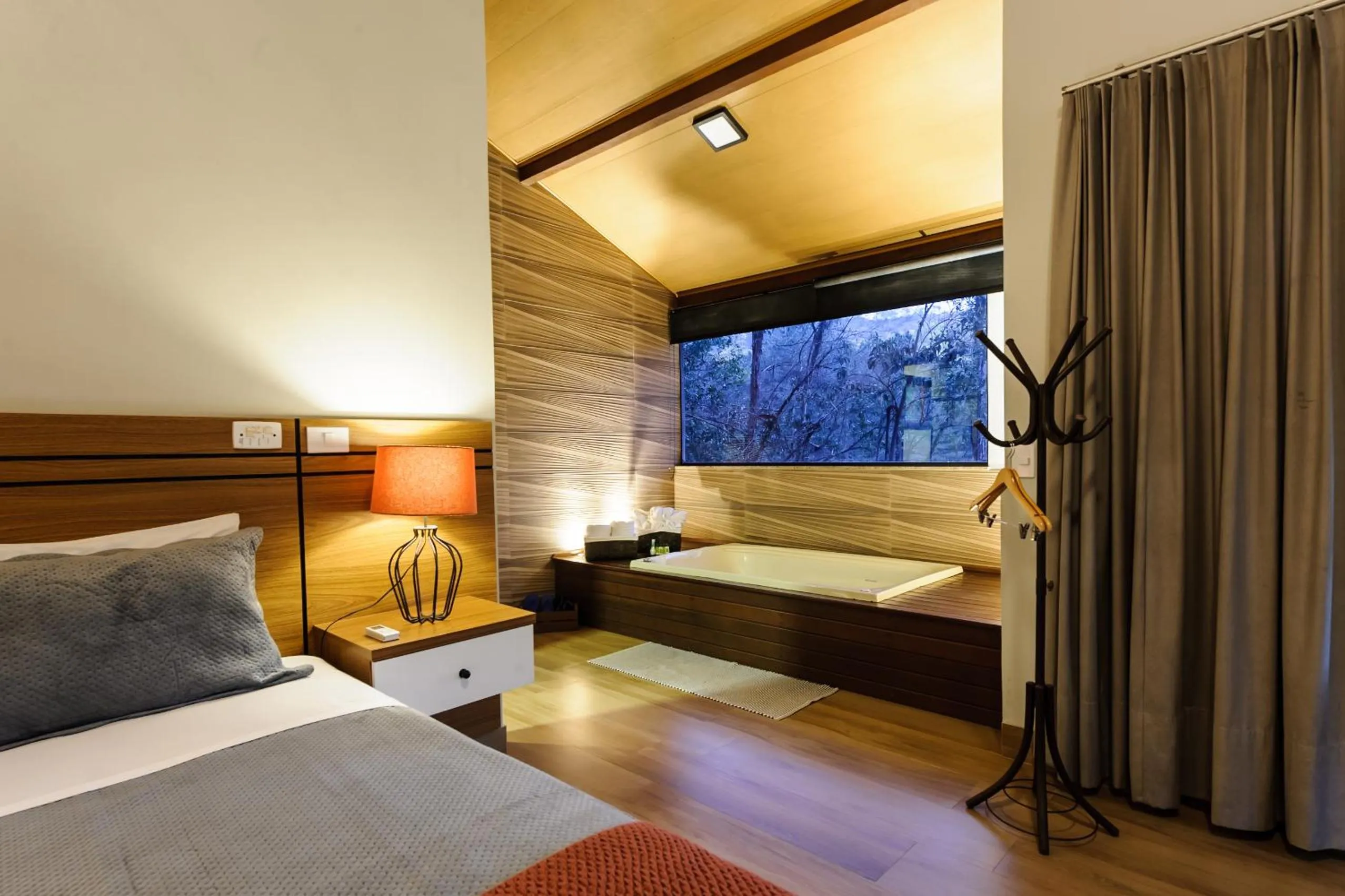 Living room, Bed in Sítio dos Lagos