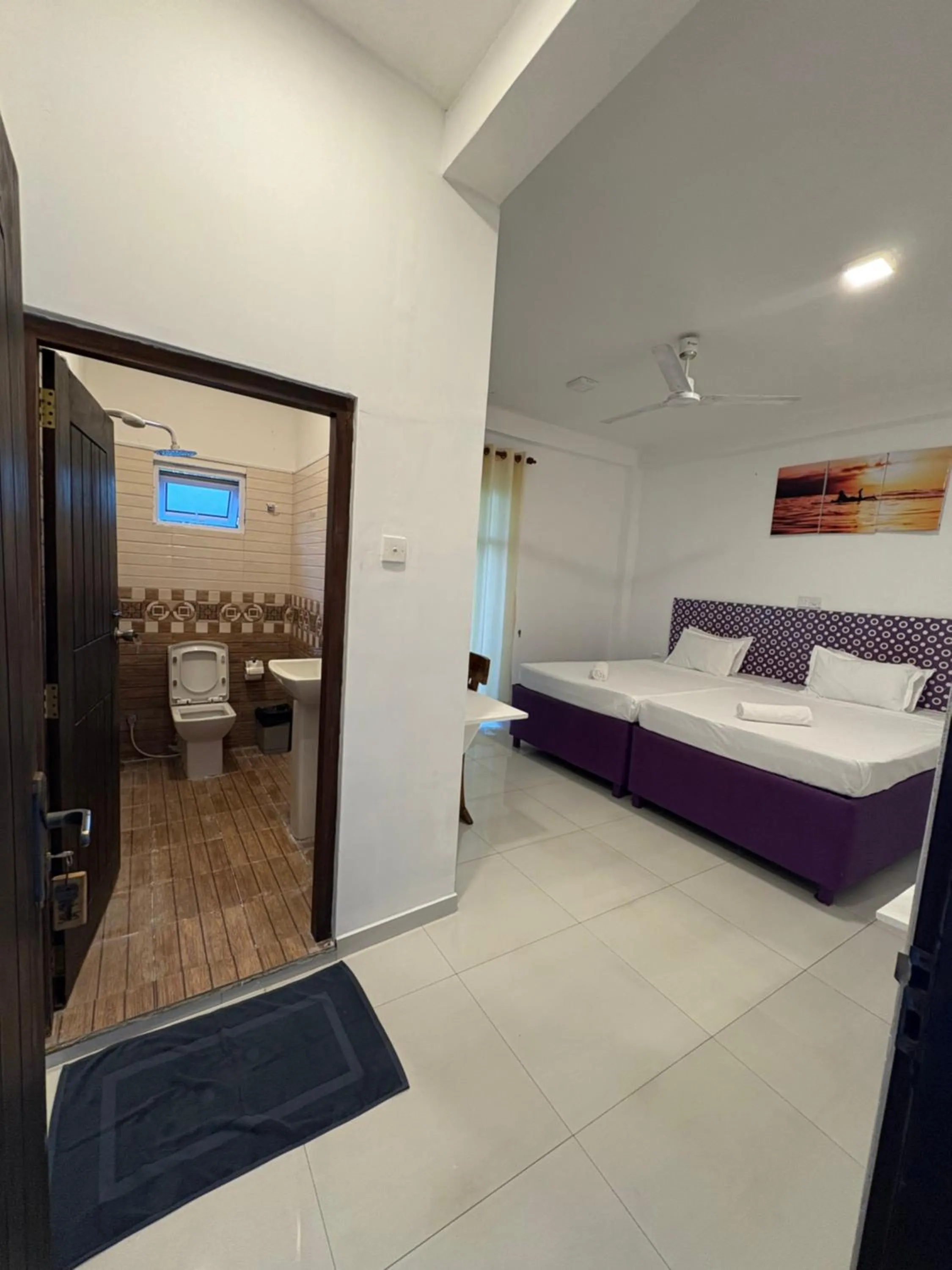 Photo of the whole room, Bed in Wake N Flow, Weligama