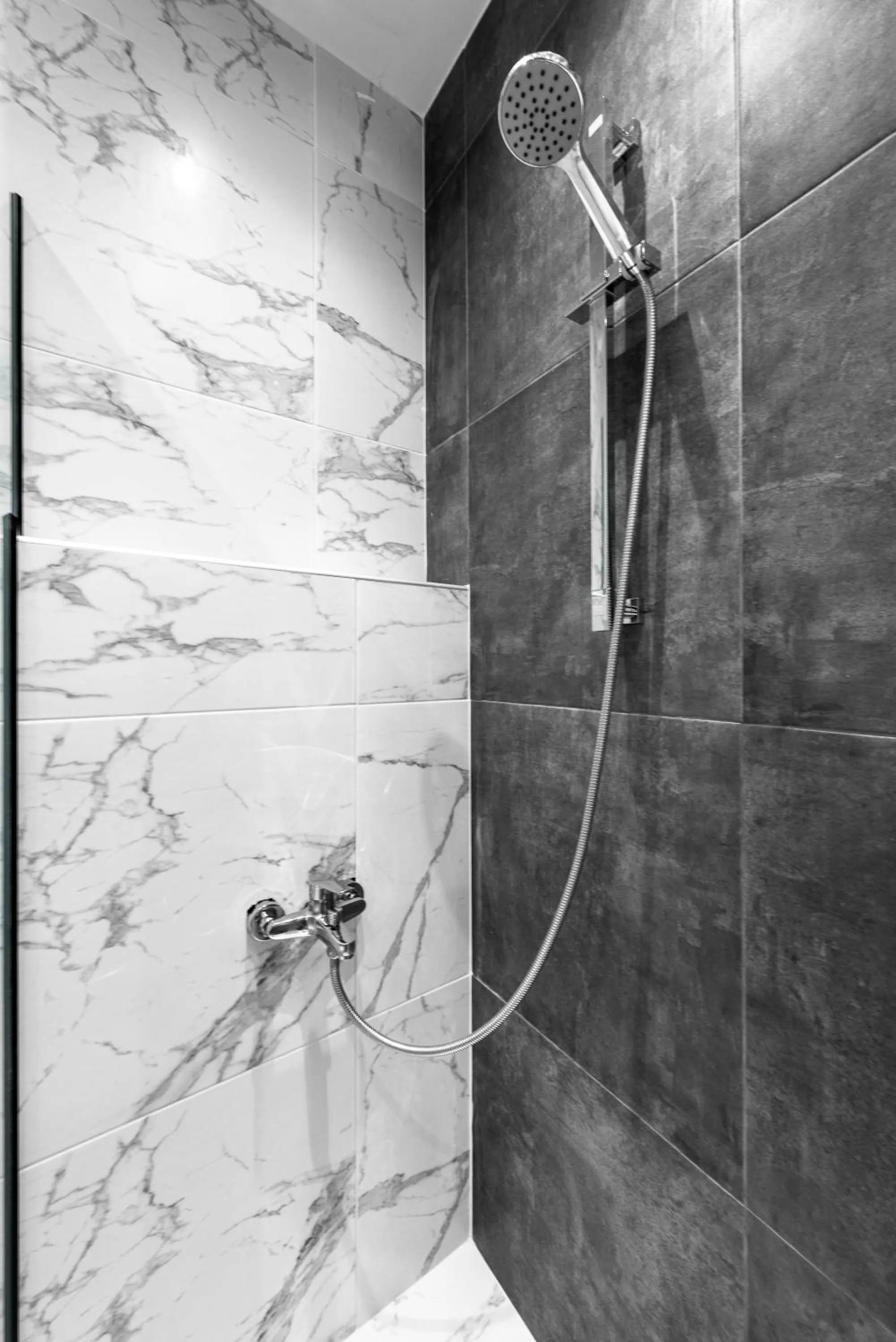 Shower in DeniZen Boutique Apartments, Nilie Hospitality MGMT