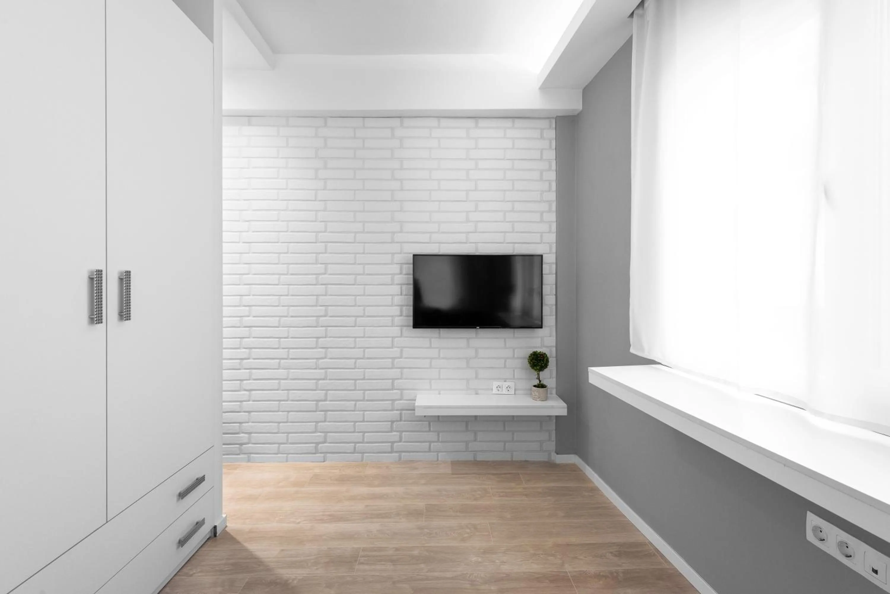 TV and multimedia in DeniZen Boutique Apartments, Nilie Hospitality MGMT