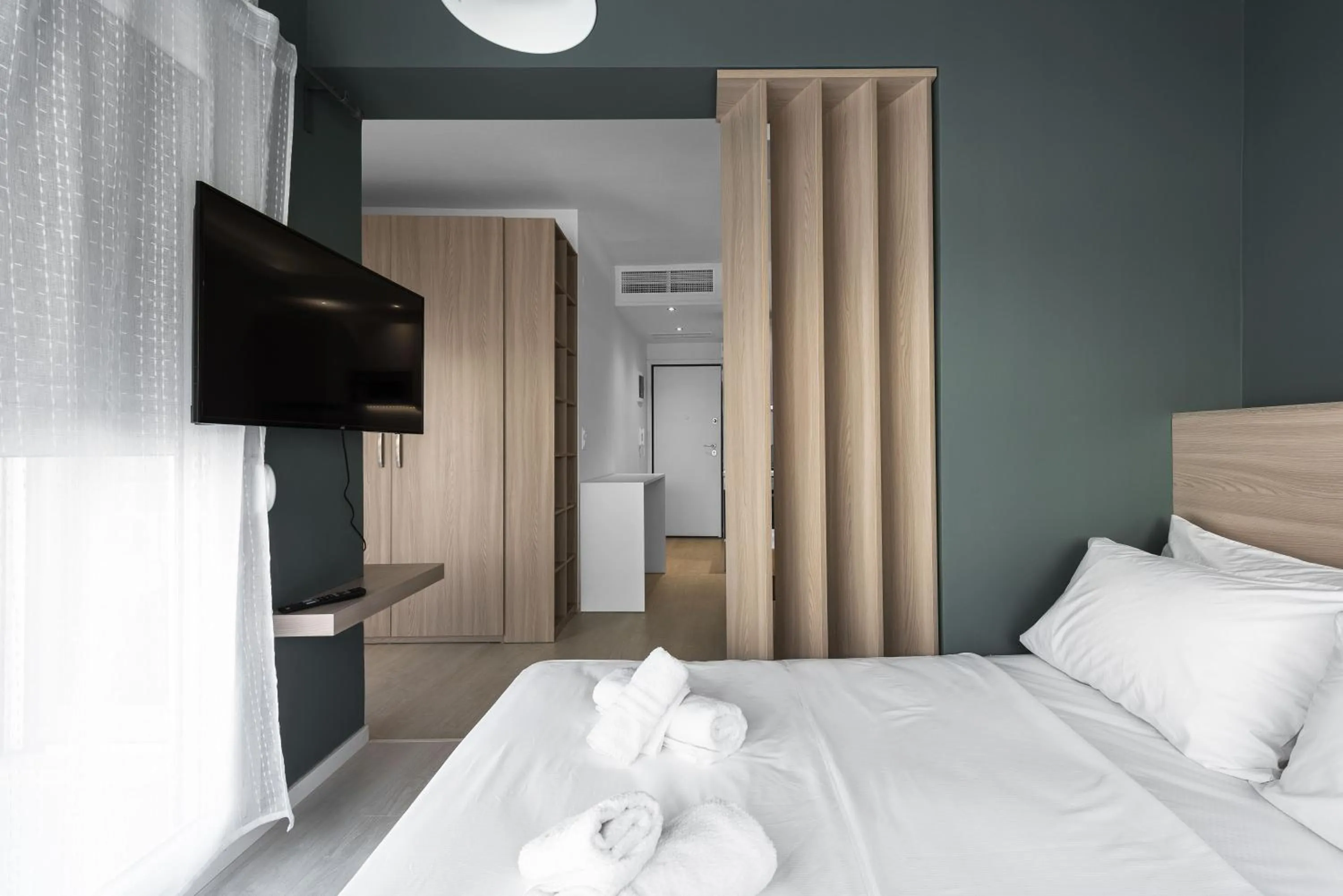 TV and multimedia in DeniZen Boutique Apartments, Nilie Hospitality MGMT