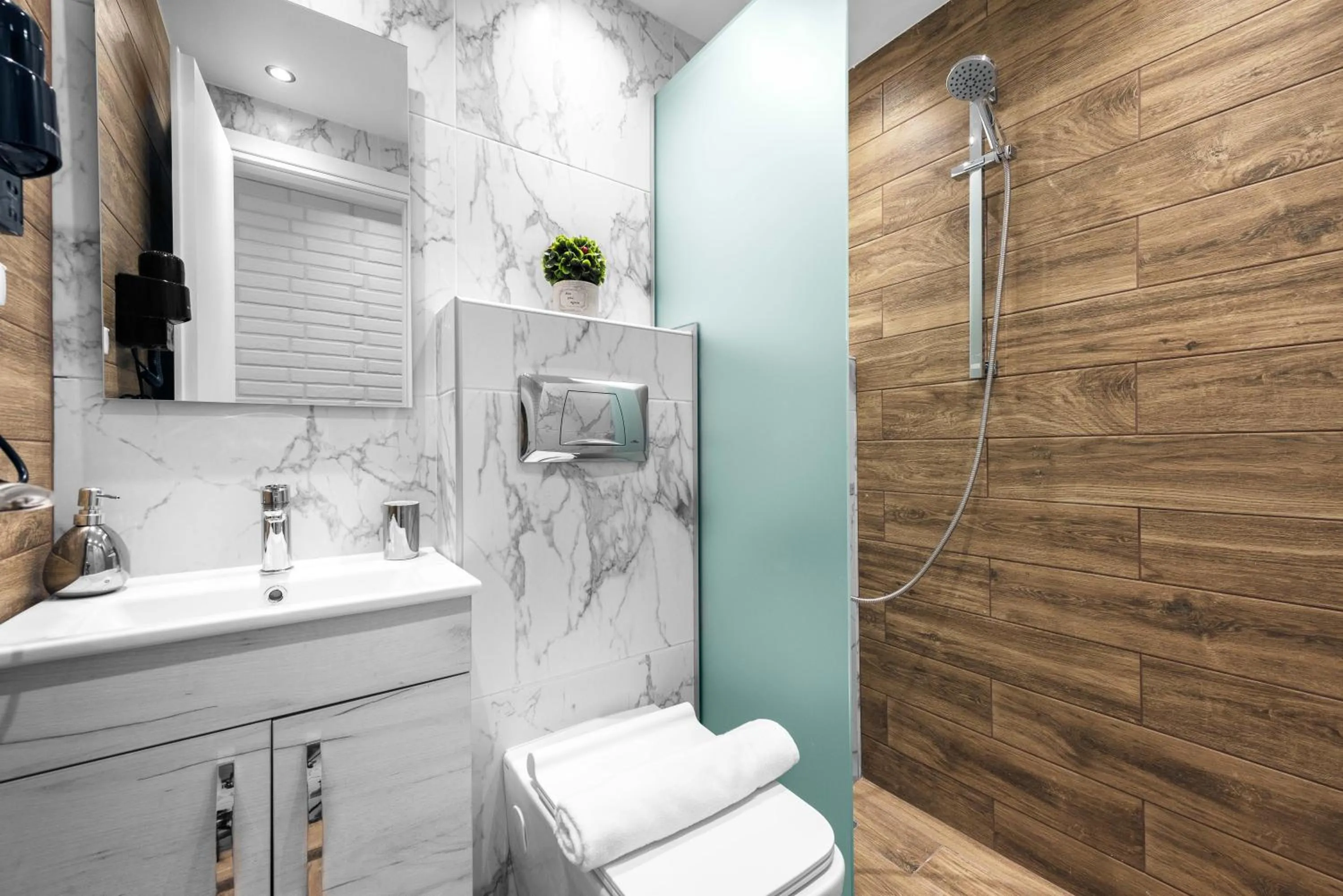 Shower in DeniZen Boutique Apartments, Nilie Hospitality MGMT