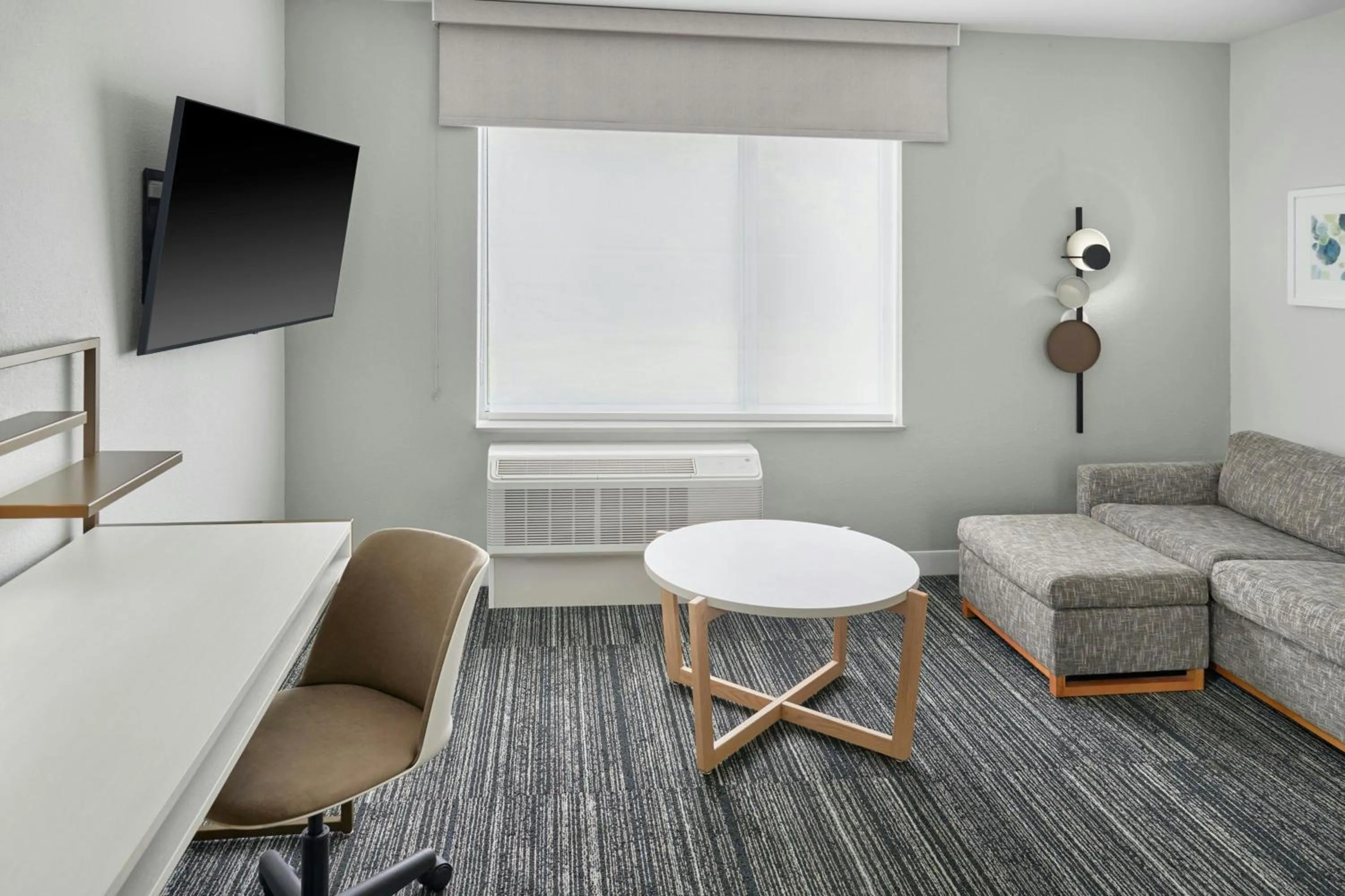 Living room in TownePlace Suites by Marriott Lansing North