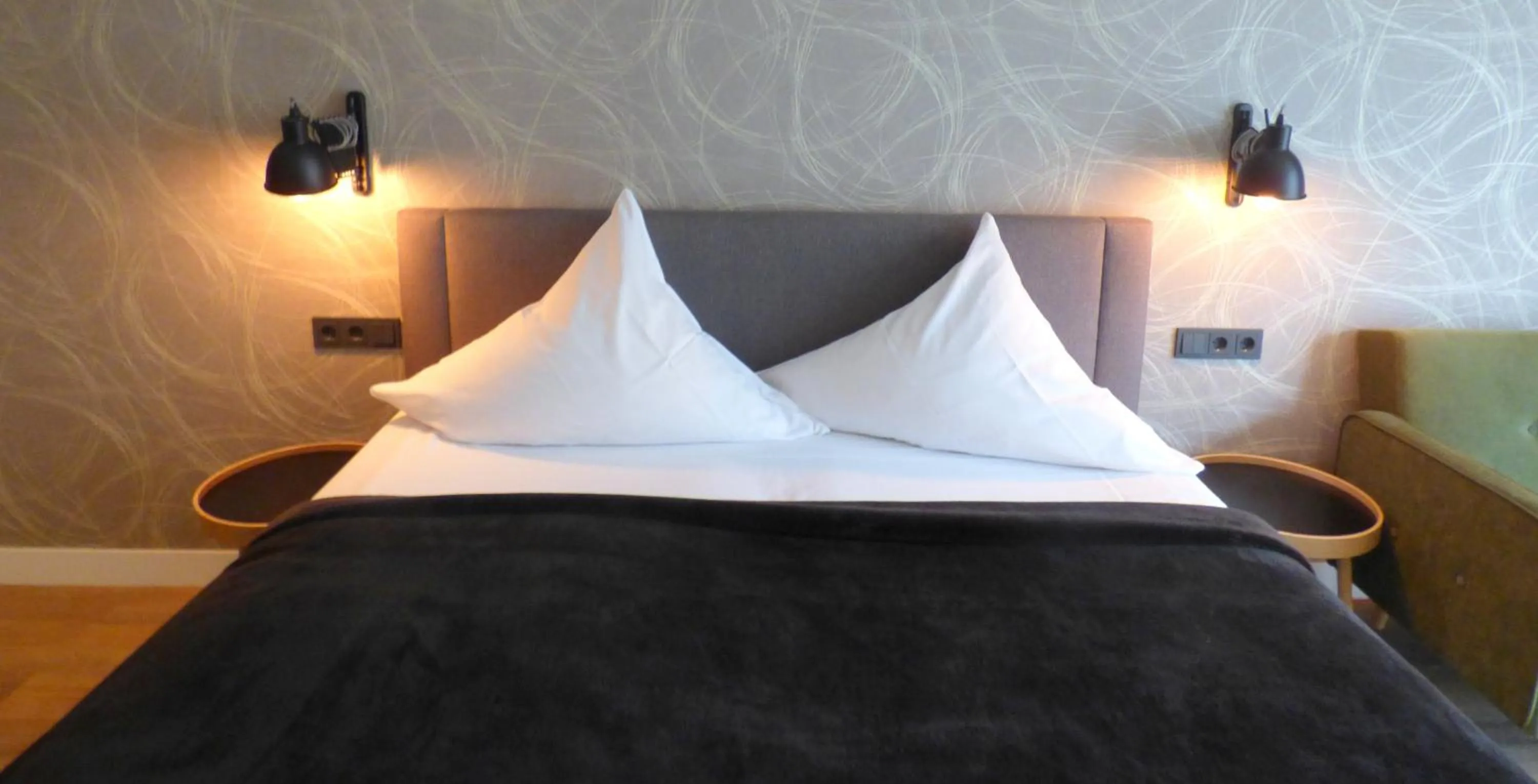 Bed in Niteroom Boutiquehotel & Apartements