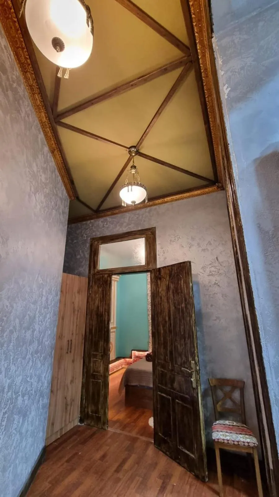 Photo of the whole room, Bed in Apartments History 1870