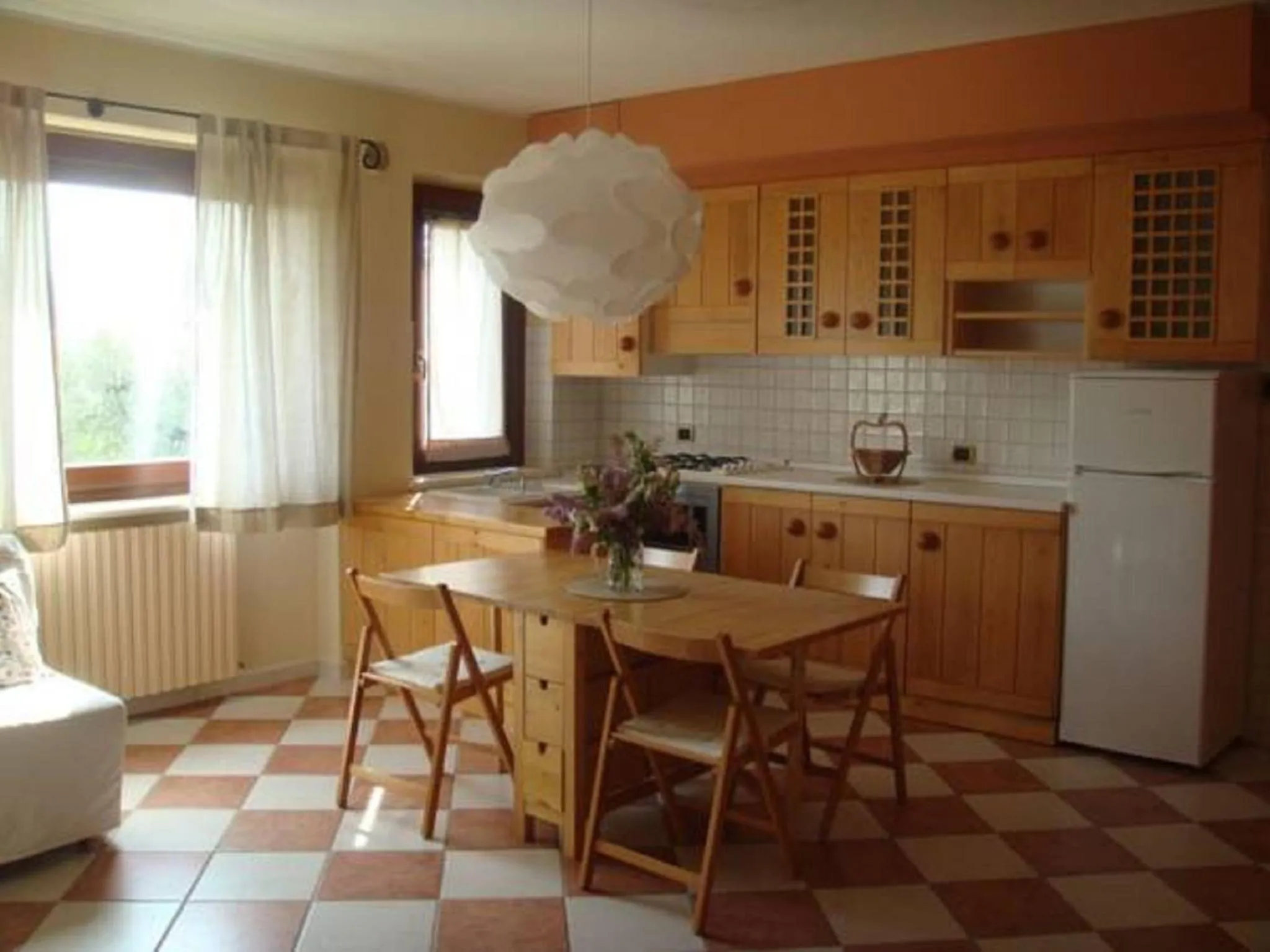 Kitchen or kitchenette in Appartamento Mimosa