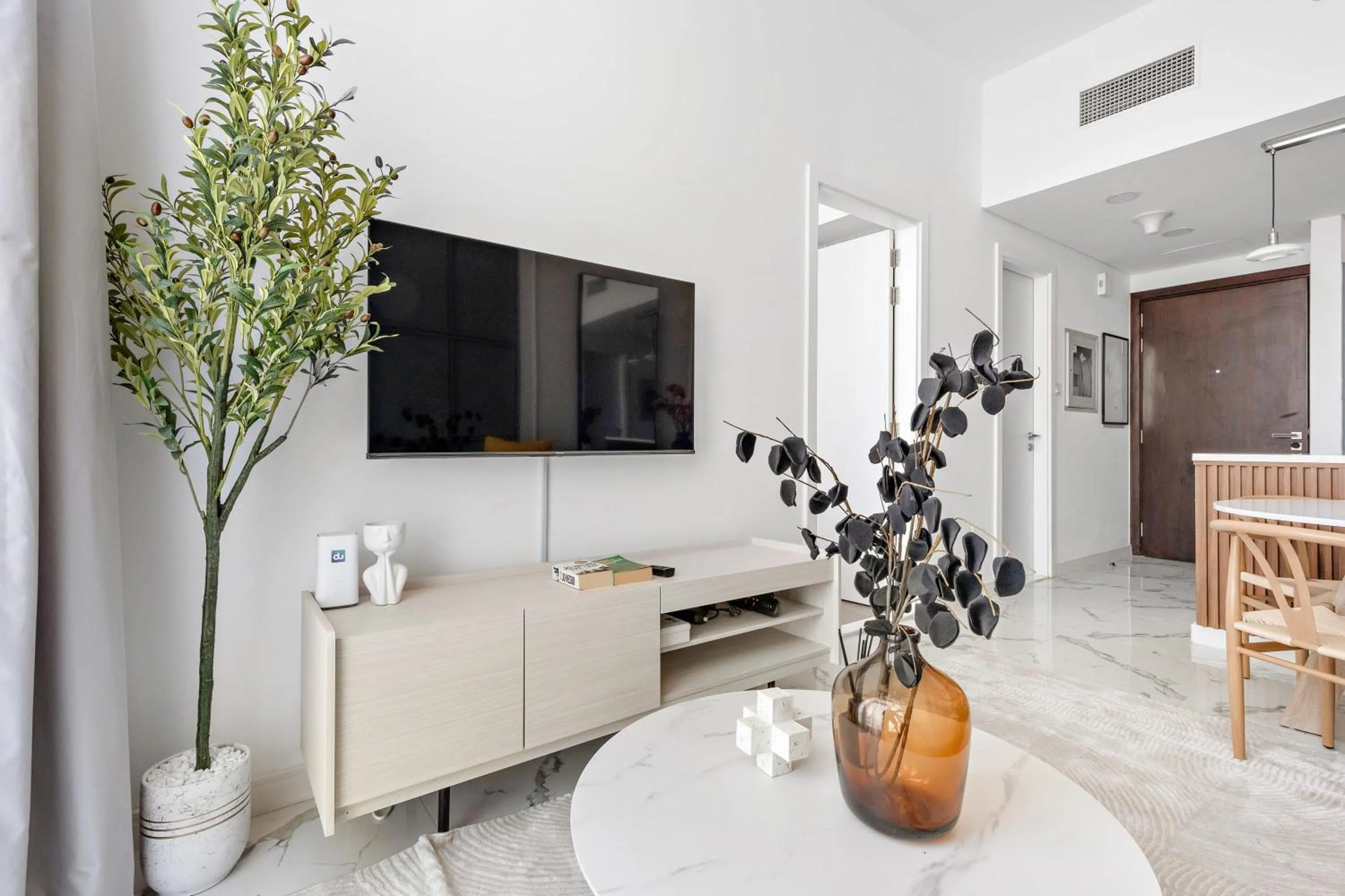 TV and multimedia in Silkhaus Vacation Homes Modern 1BDR in Oasis Near Masdar City Park