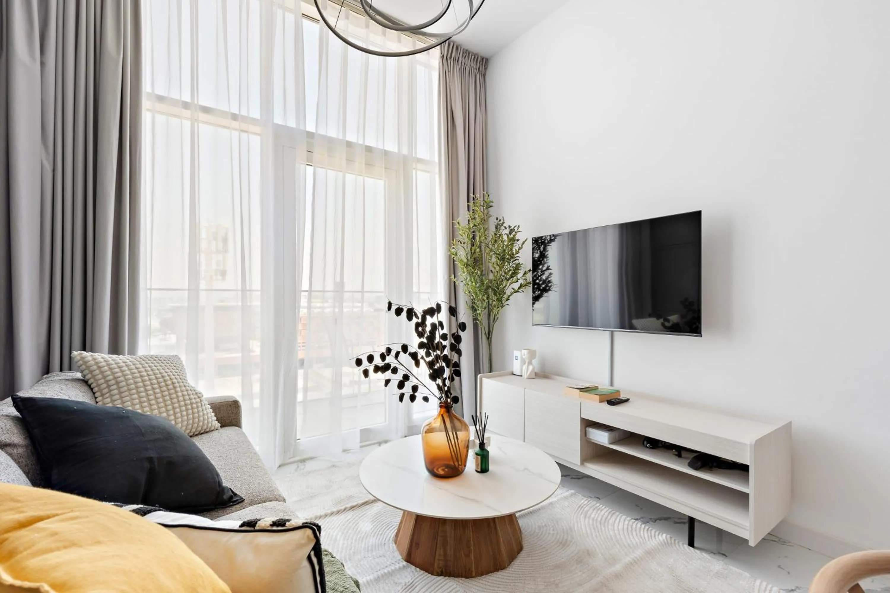 TV and multimedia in Silkhaus Vacation Homes Modern 1BDR in Oasis Near Masdar City Park