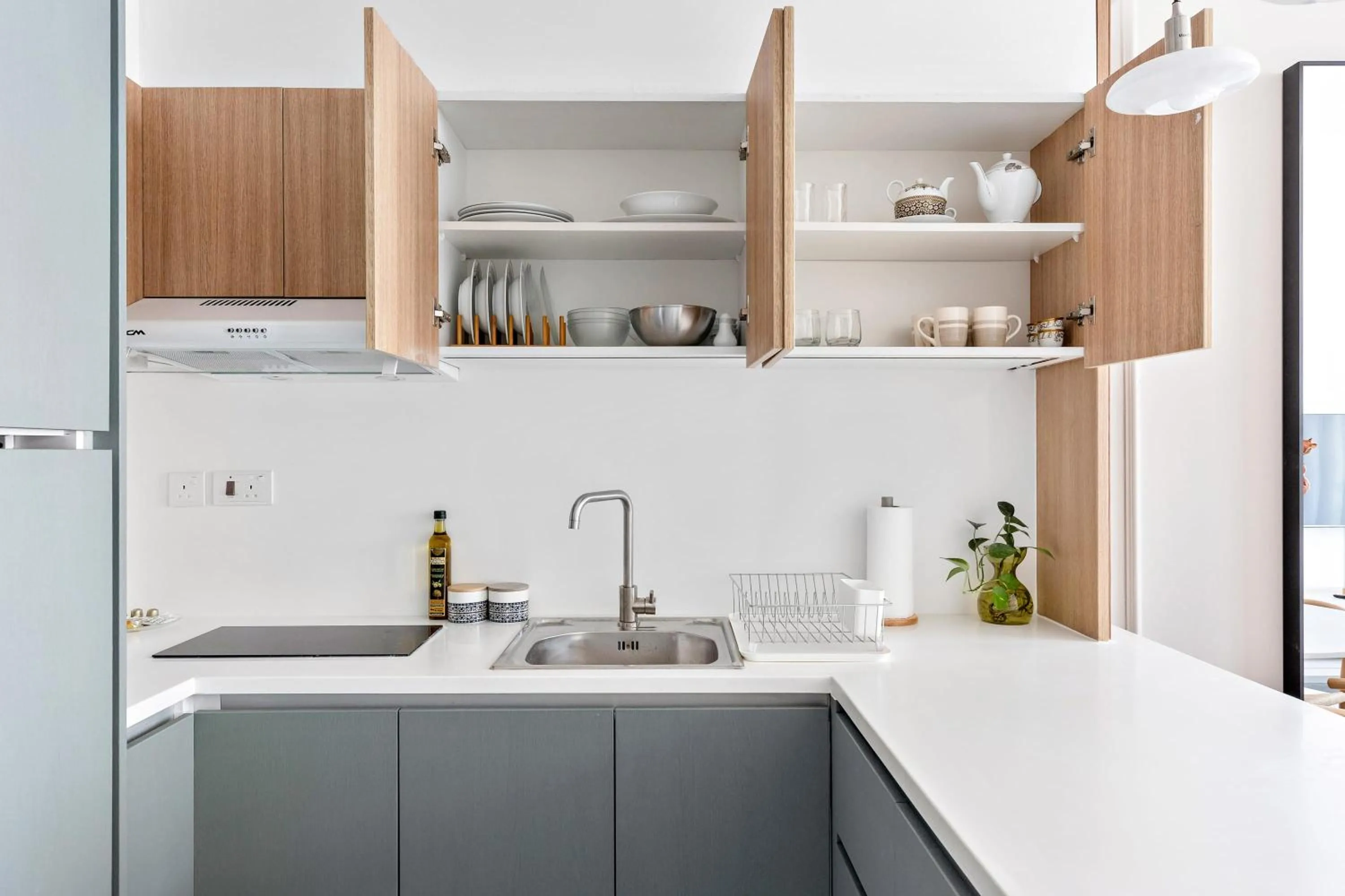 Kitchen or kitchenette in Silkhaus Vacation Homes Modern 1BDR in Oasis Near Masdar City Park