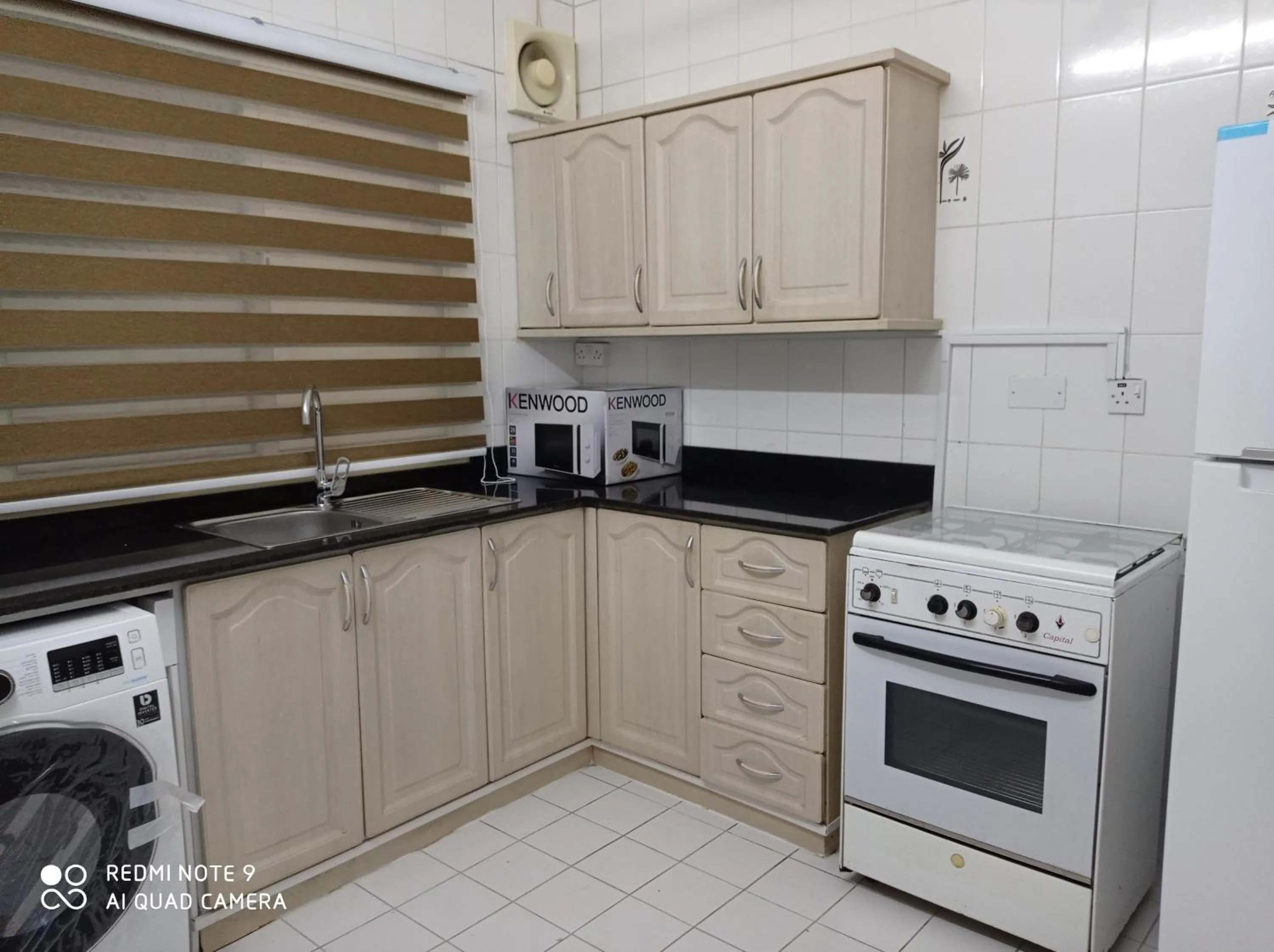 Kitchen or kitchenette in Frsan Plaza