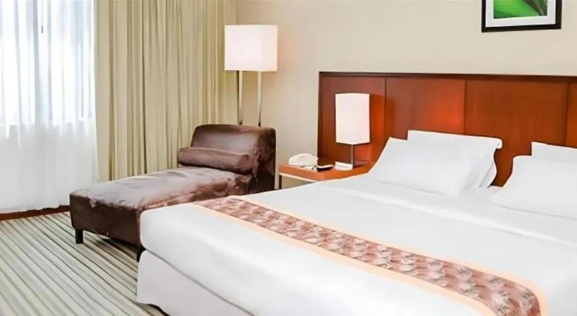 Bed in RH Hotel Sibu