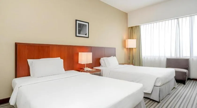 Bed in RH Hotel Sibu