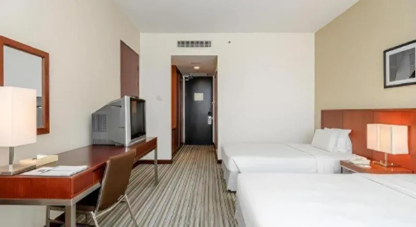 Bed in RH Hotel Sibu